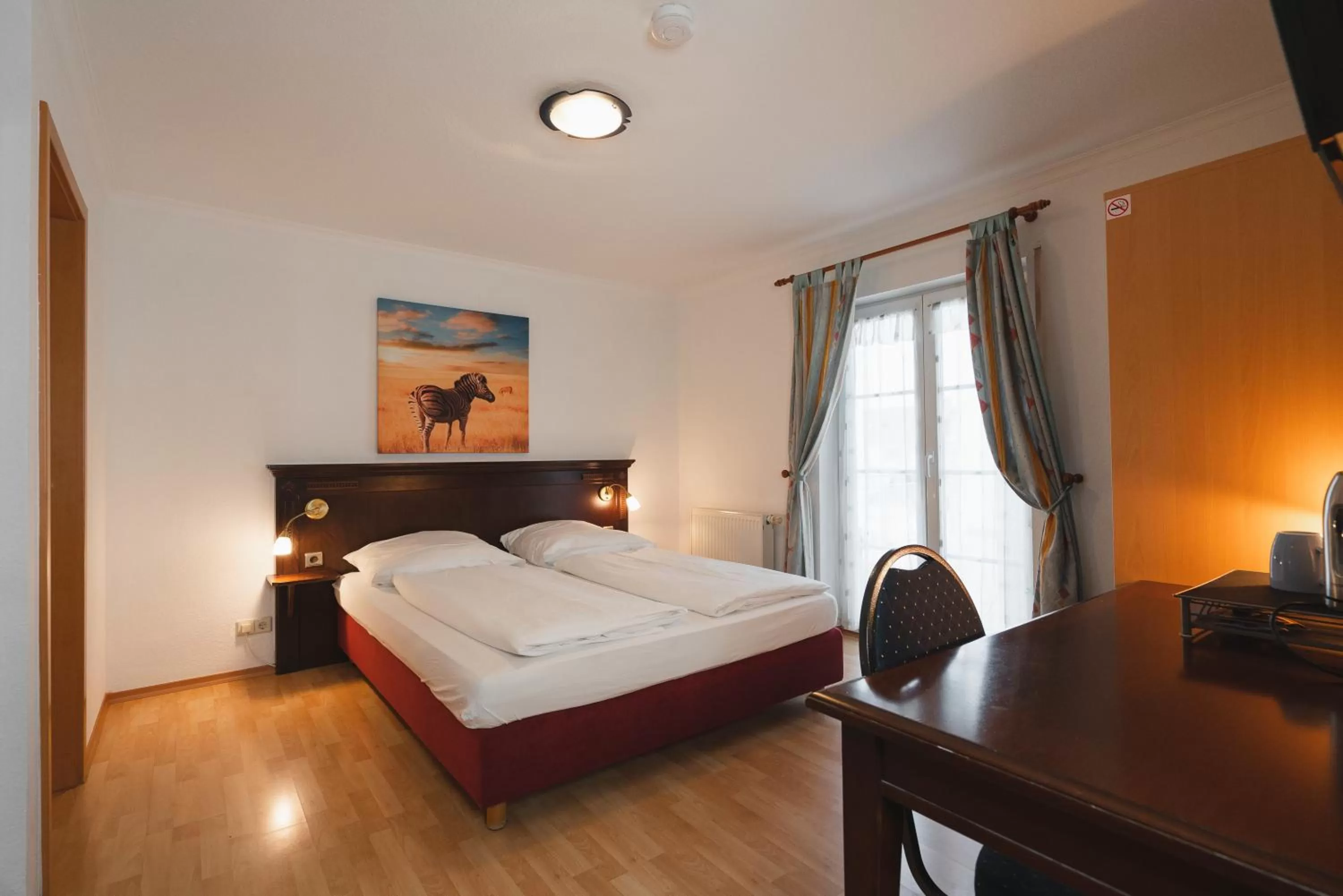 Bed in Park Hotel & Gästehaus Rust