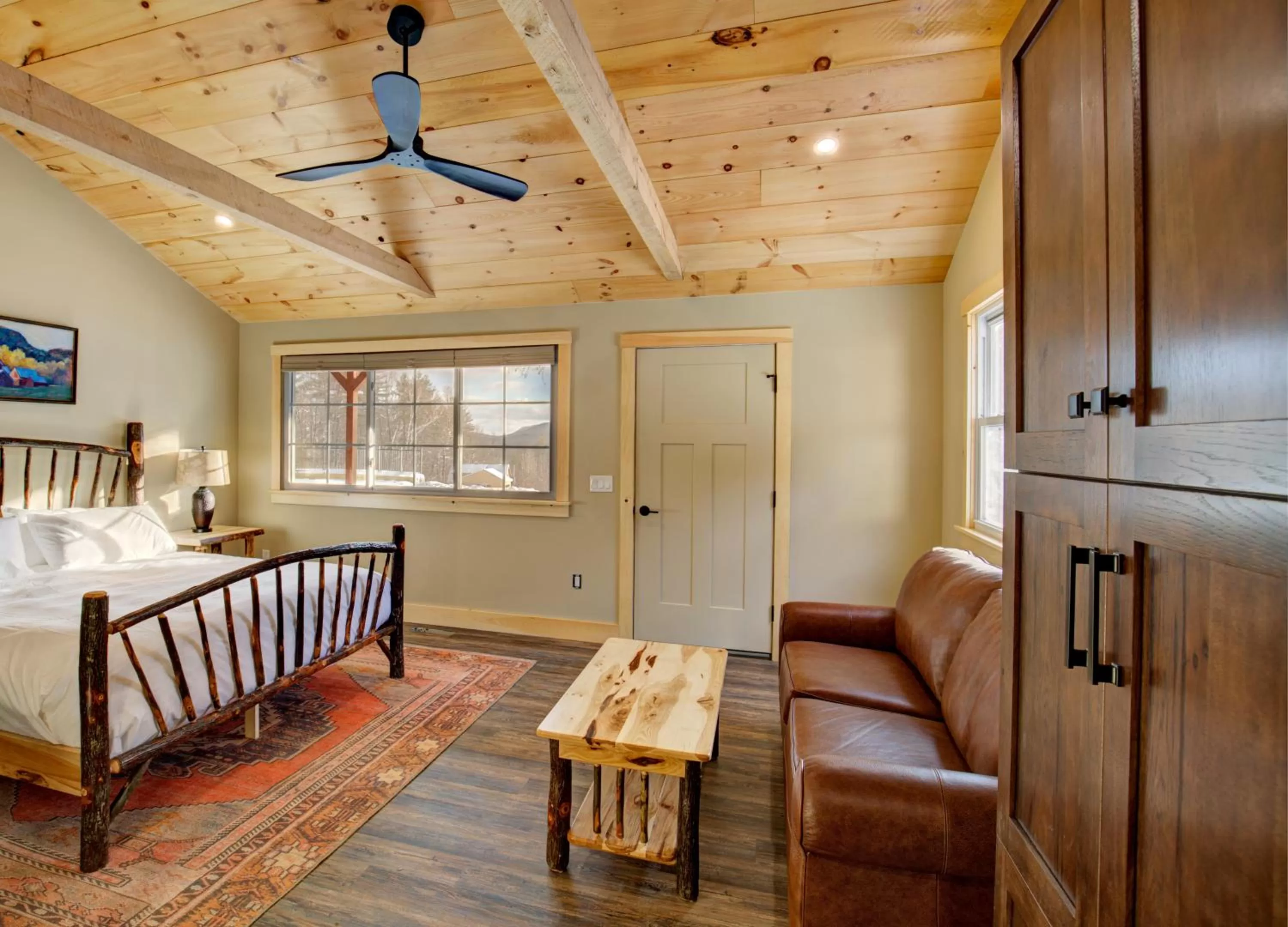 Bed in The Lodge by Sunapee Stays