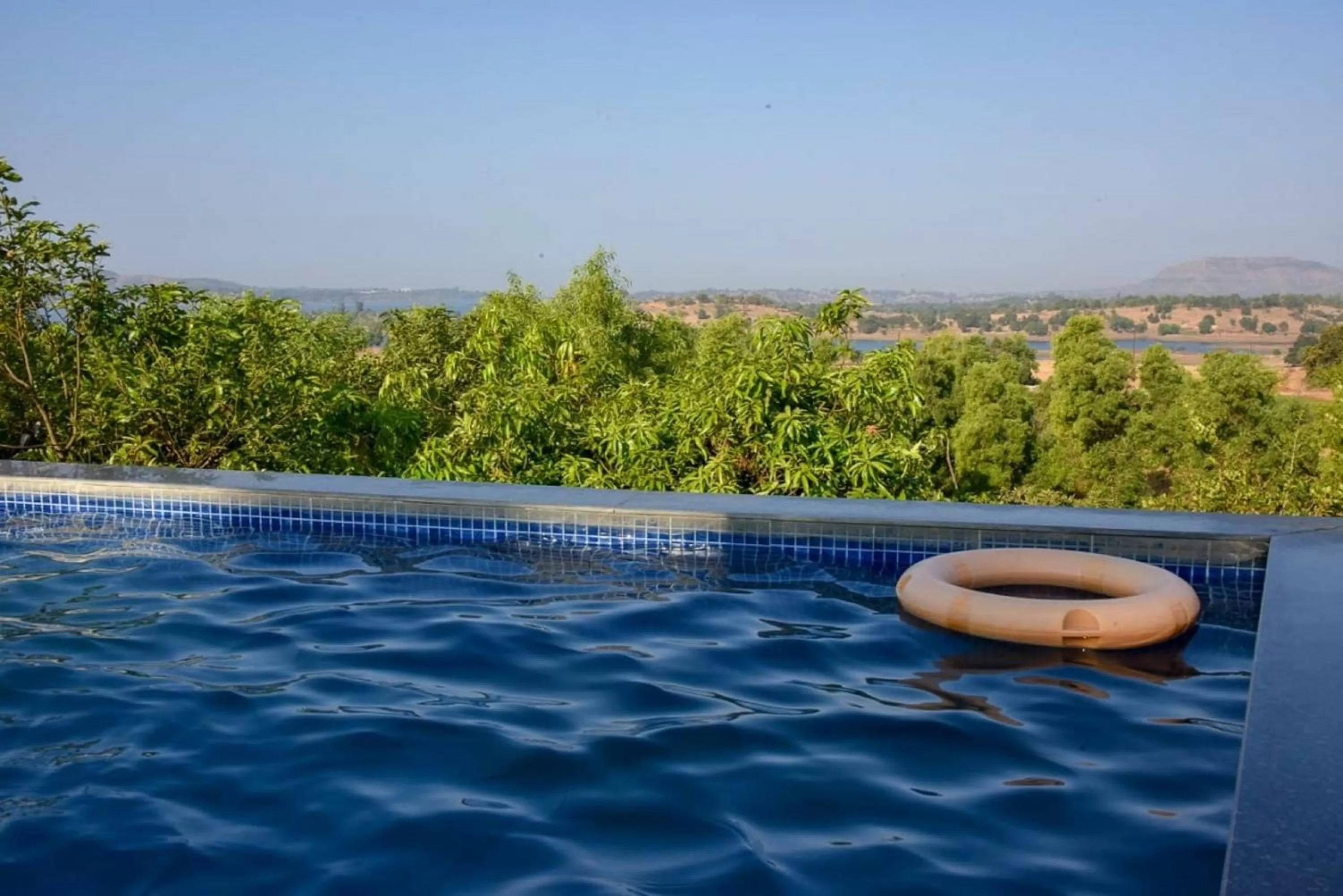 Swimming pool in Jayshin Lake Vaitarna Resort - Igatpuri