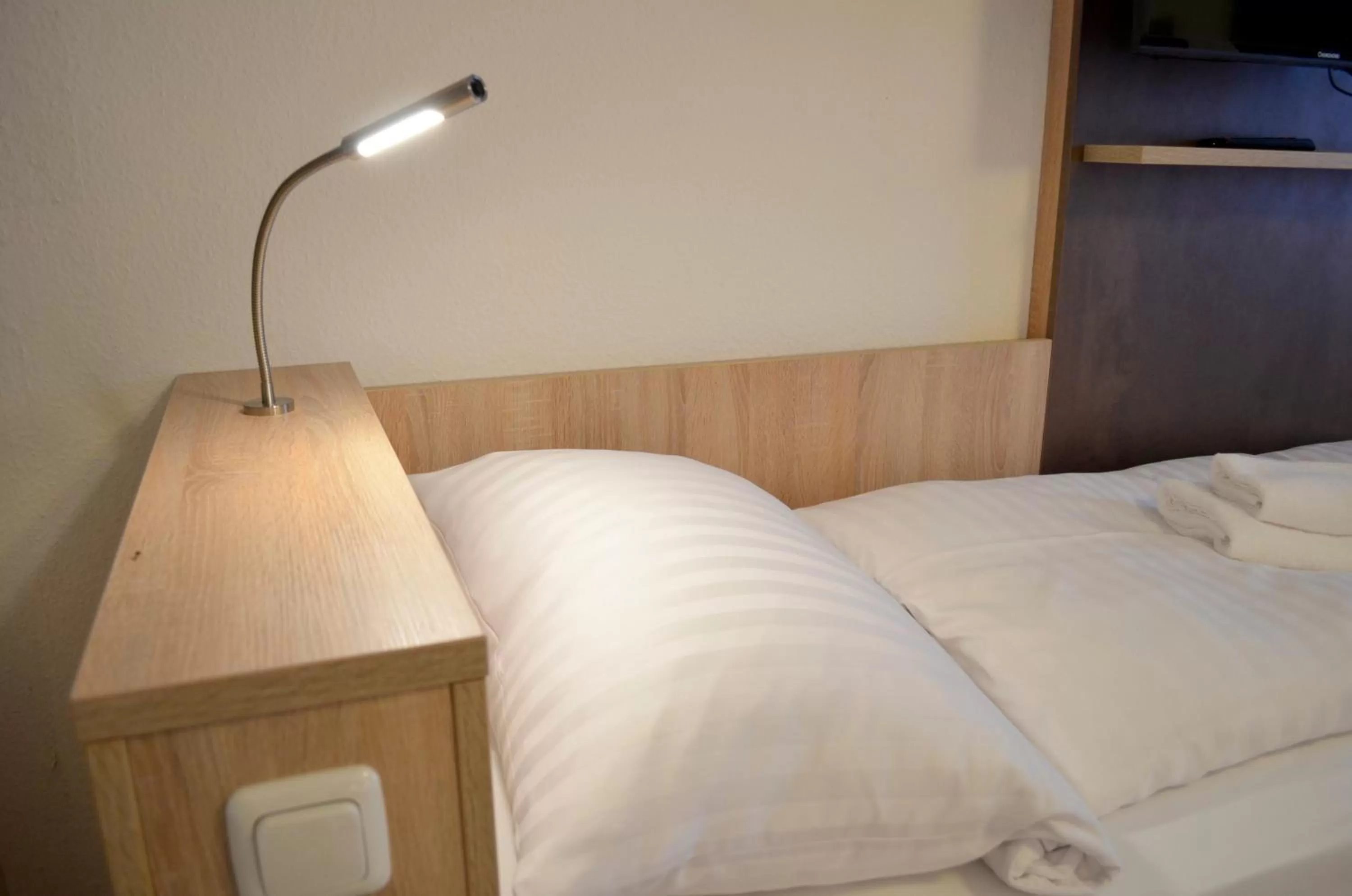 Bed in Hana Aparthotel