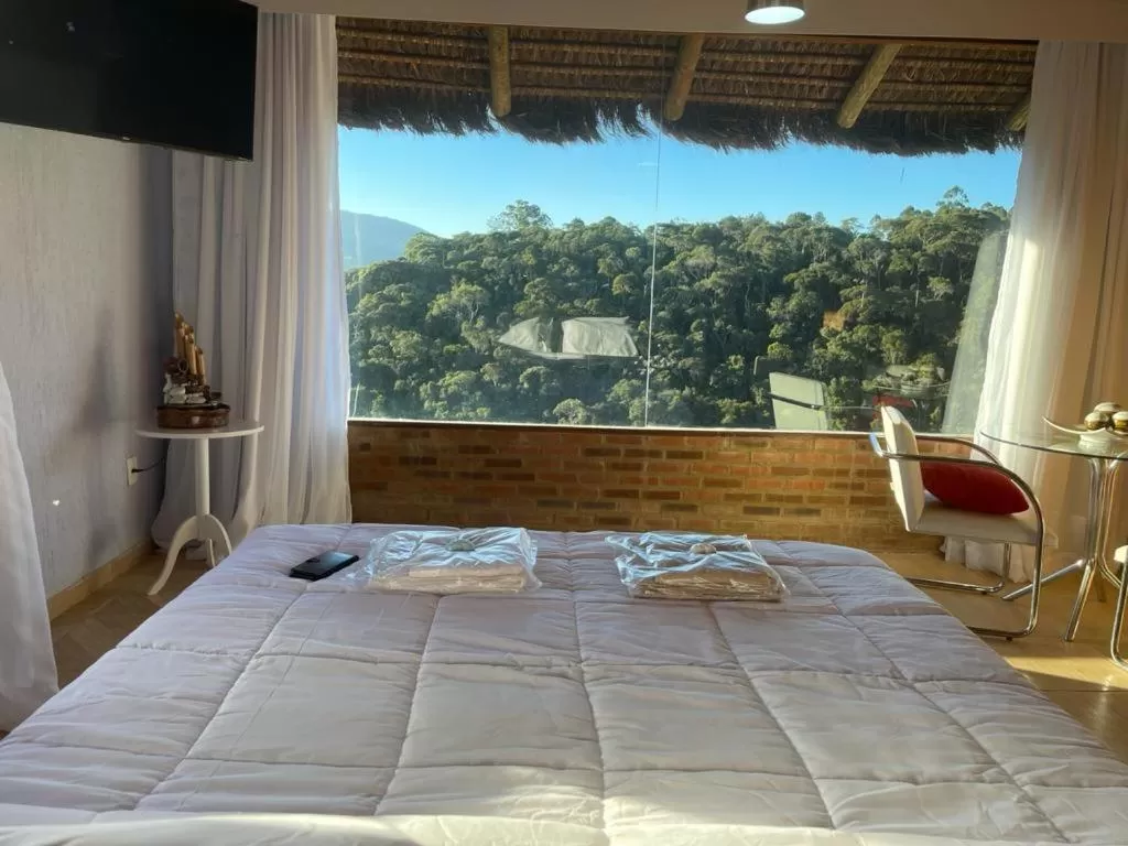 Bed in Pousada R.N.C. Nosso Paraíso