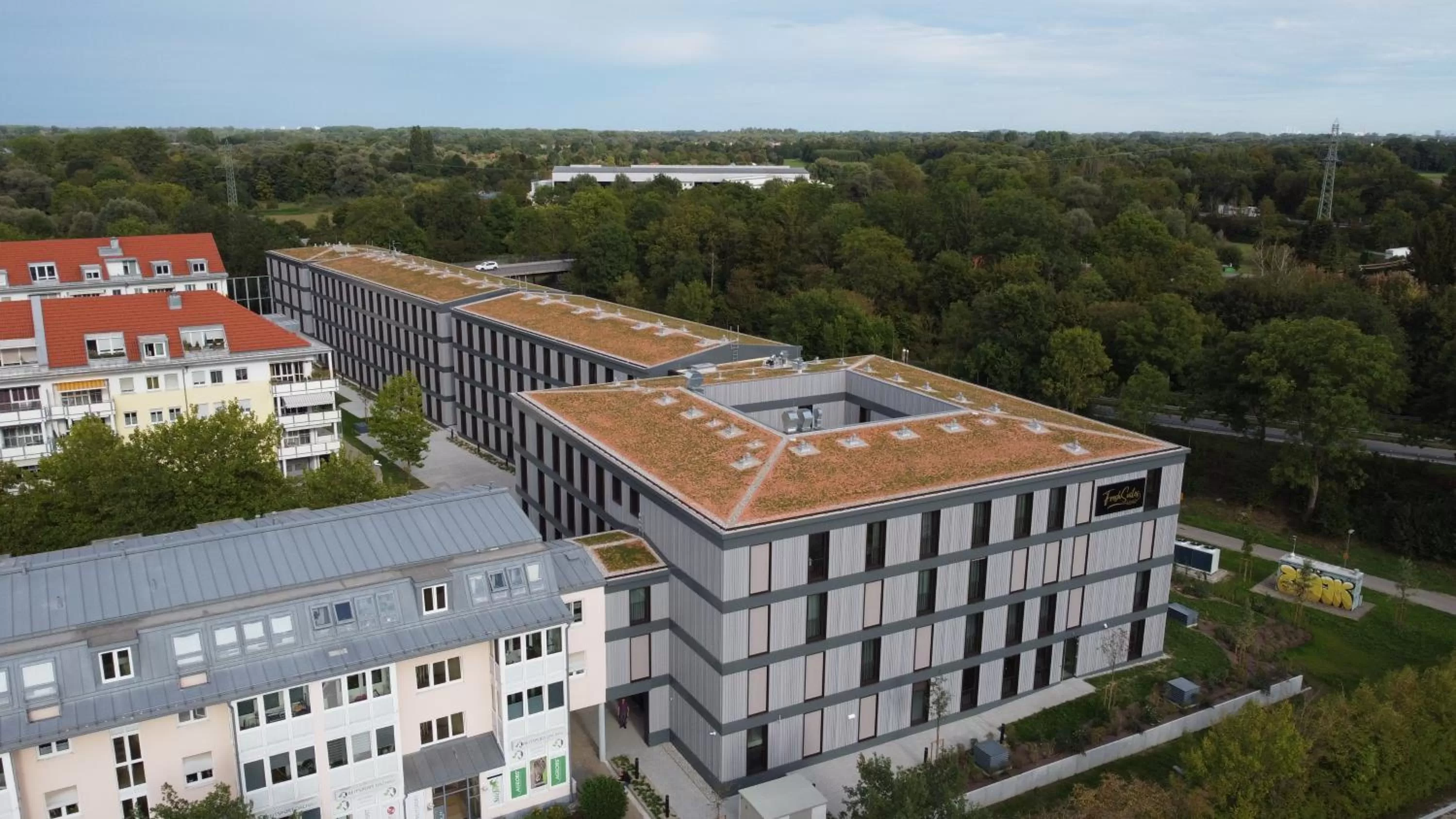 Property building in FreshSuites & Bar