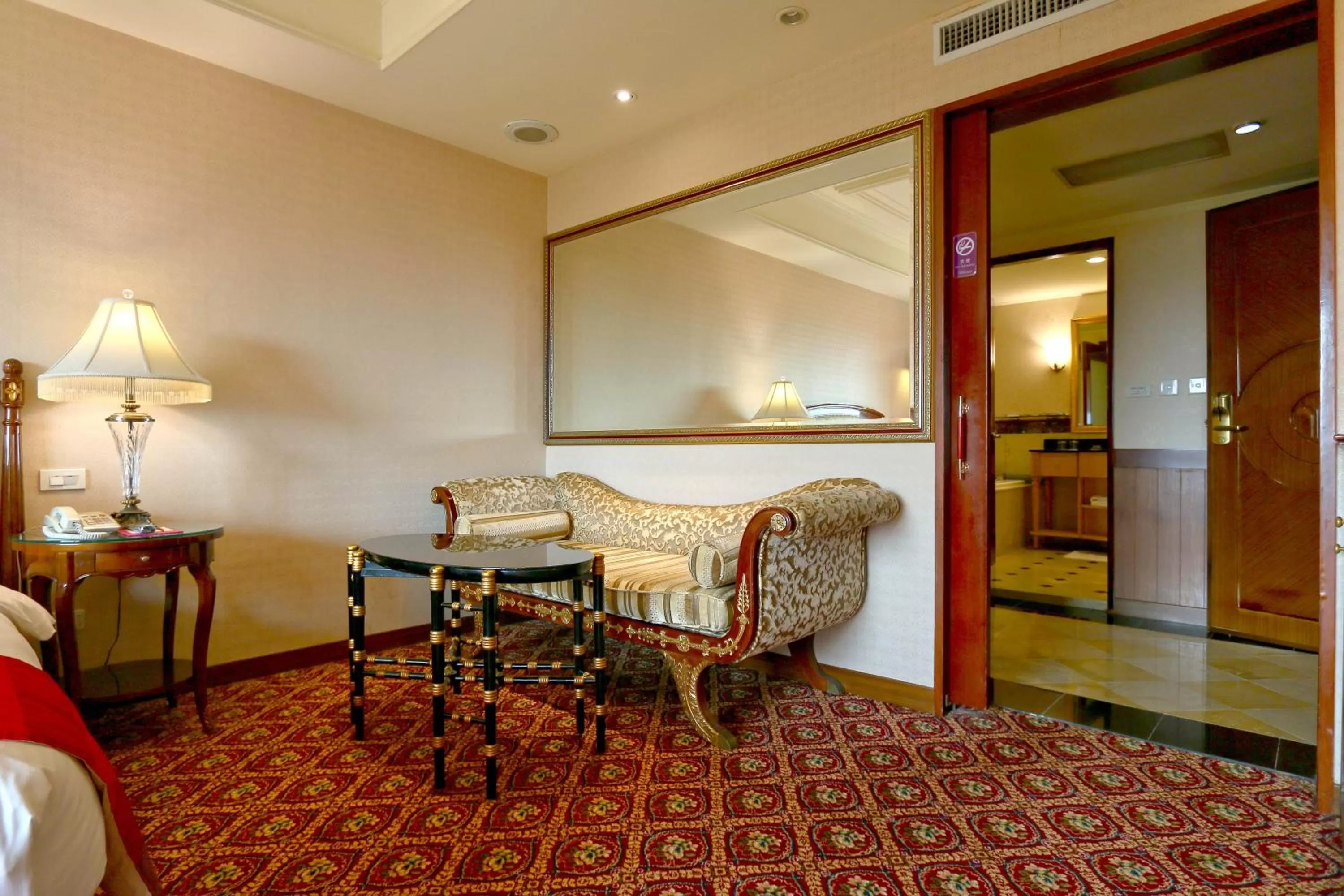 Seating area, Bed in Rido Hotel