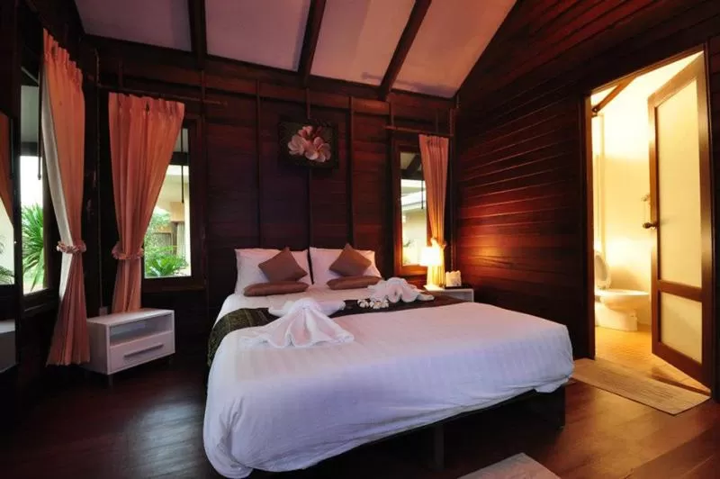 Bed in Panlaan Boutique Resort