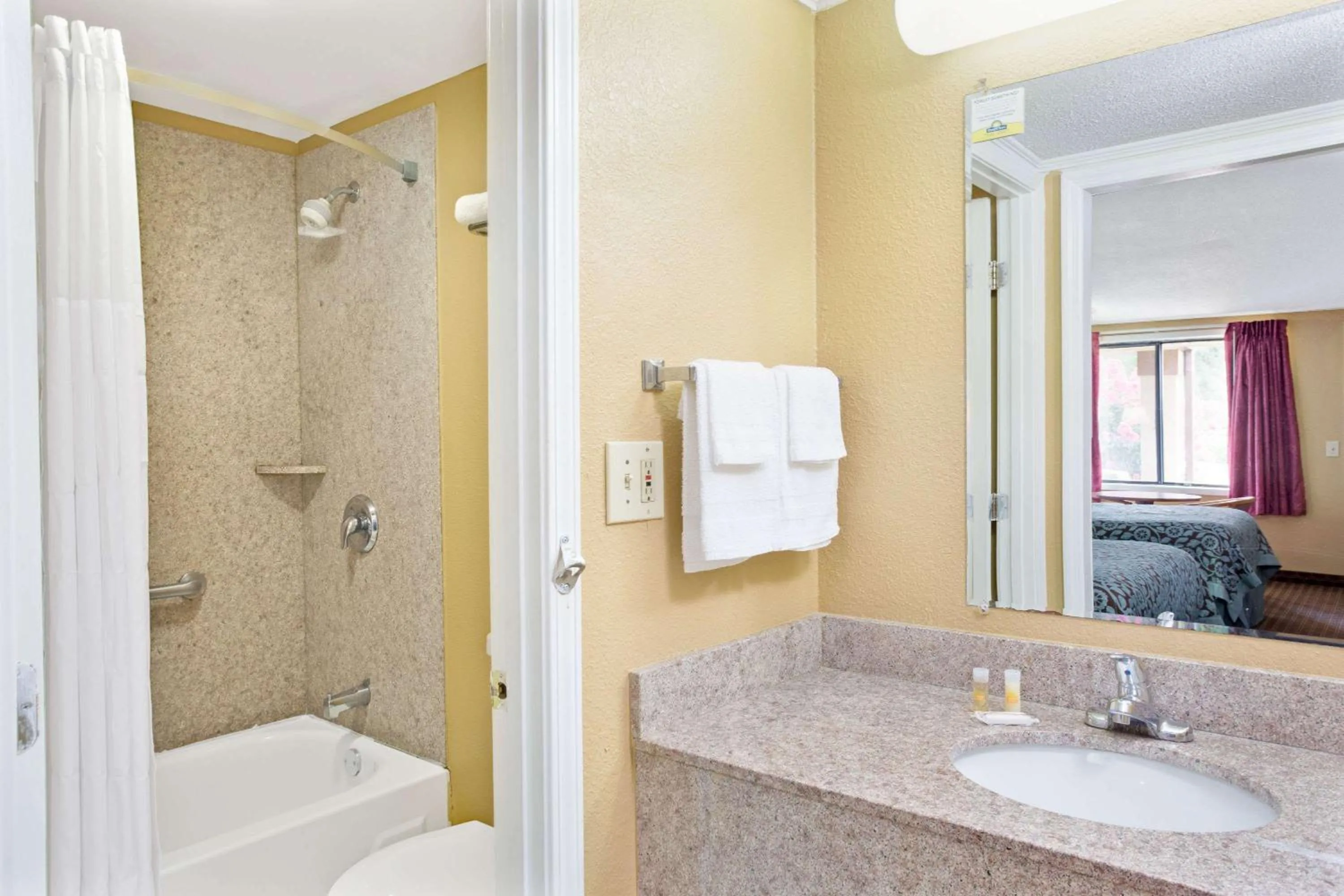 Bathroom in Days Inn by Wyndham Lawrenceville