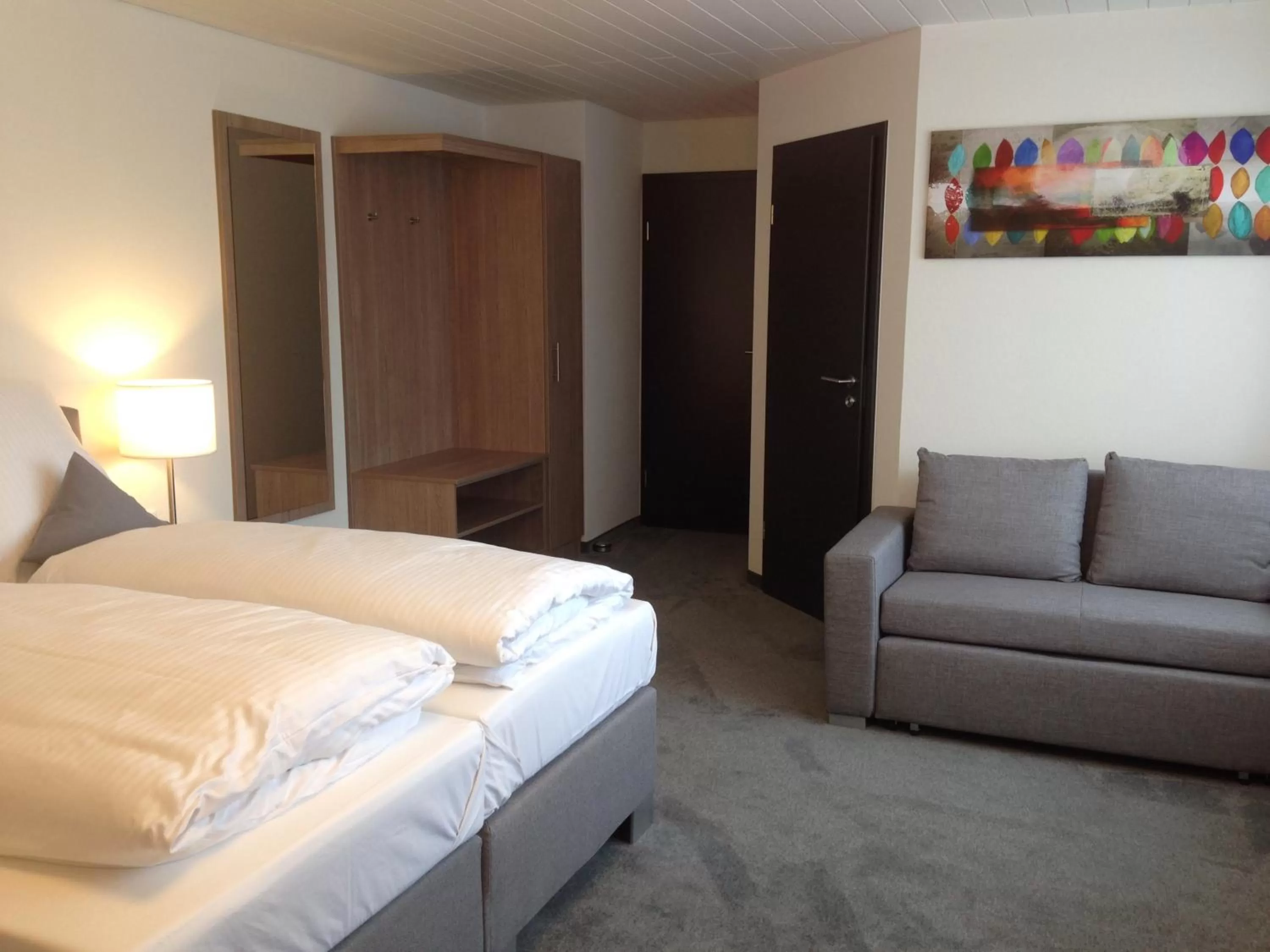 Seating area, Bed in Tankbar's Hotelchen