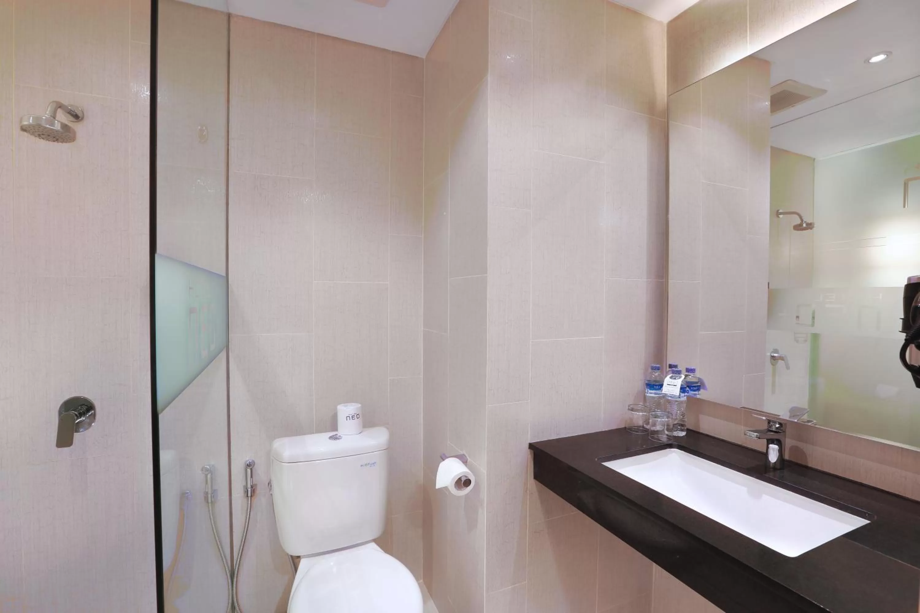 Bathroom in Hotel NEO+ Kuta Legian by ASTON