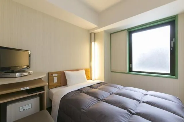 Photo of the whole room, Bed in R&b Hotel Shinyokohamaekimae