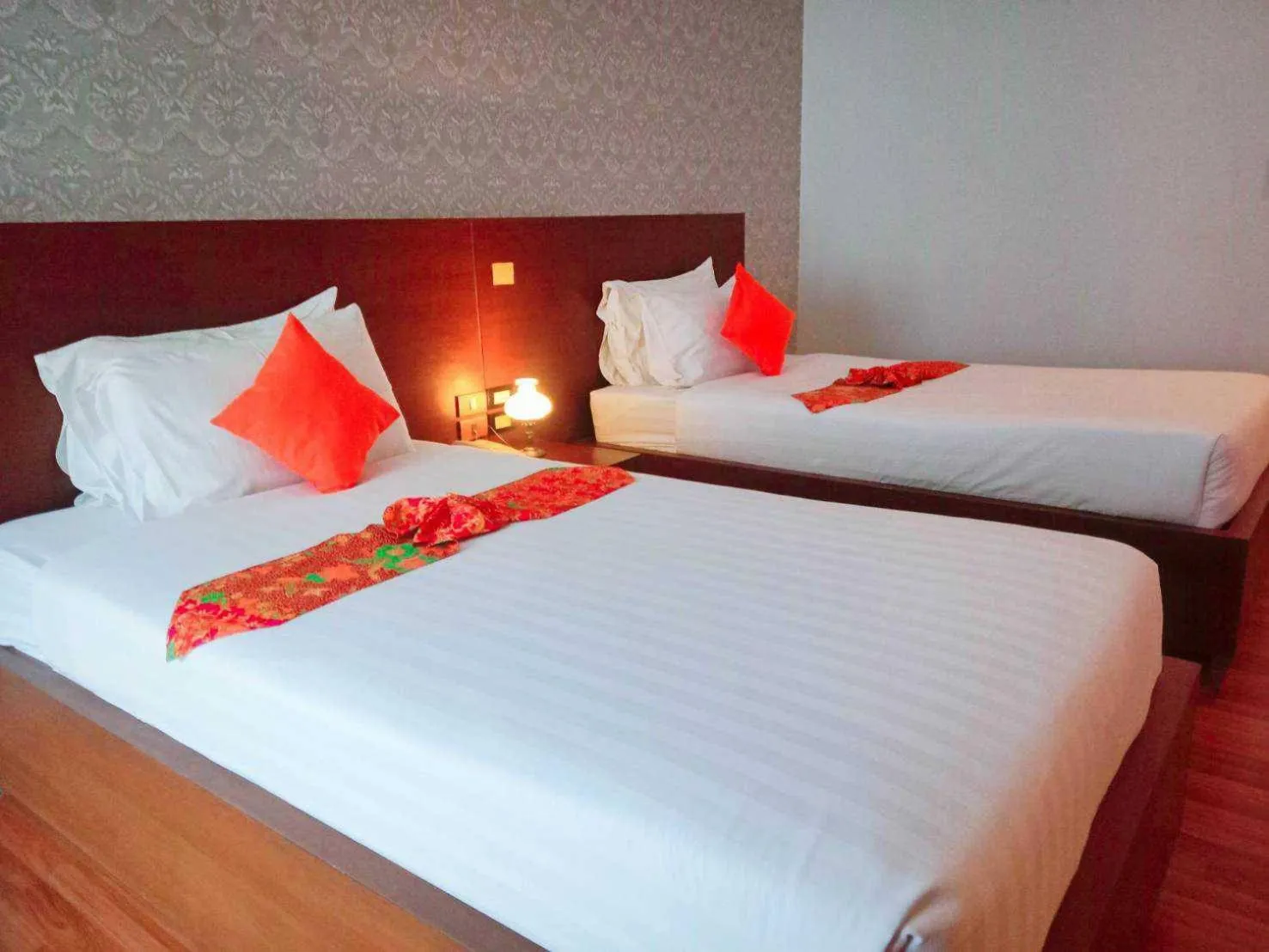 Bed in Jingjit Hotel