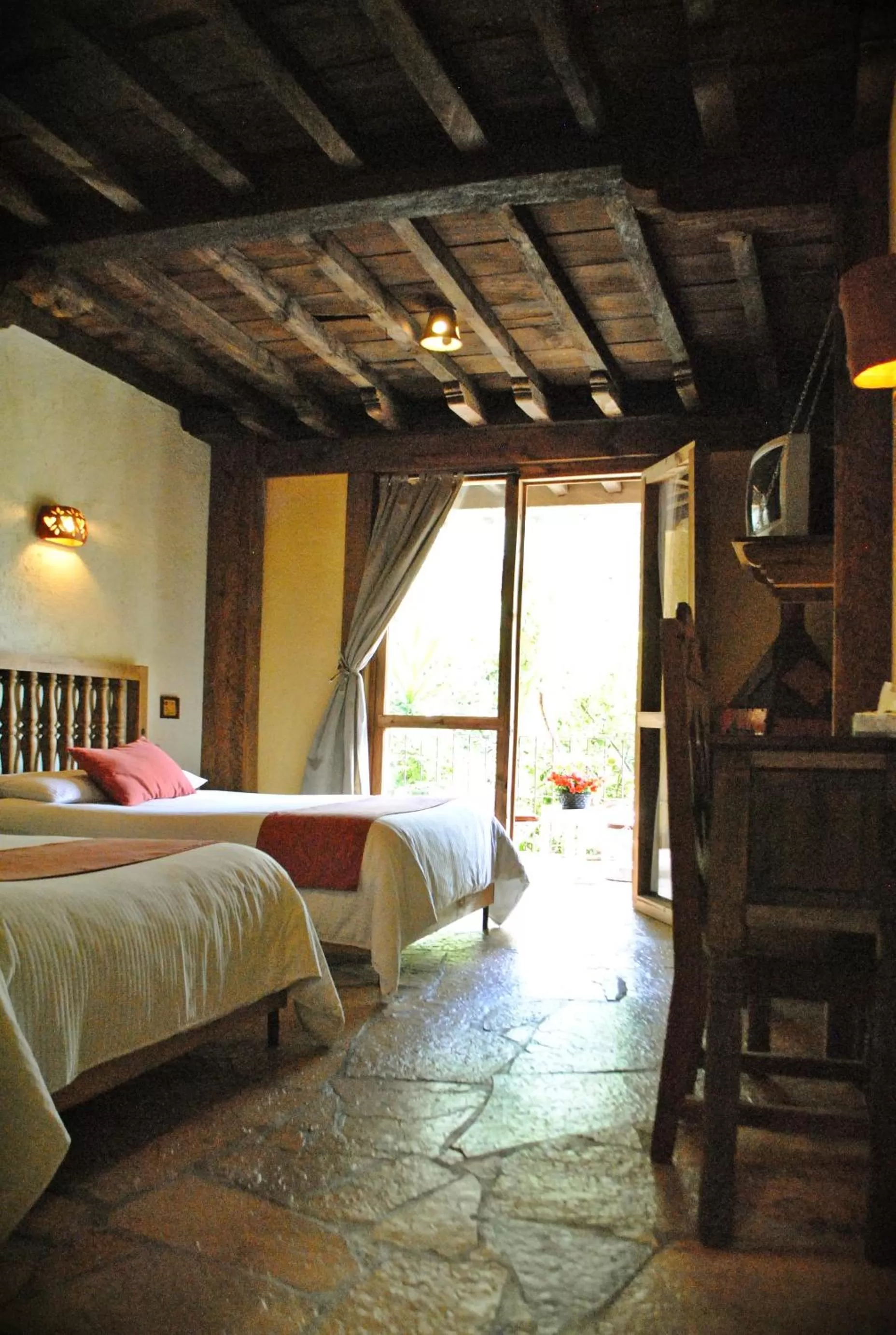 Bed in Hotel Hacienda Don Juan