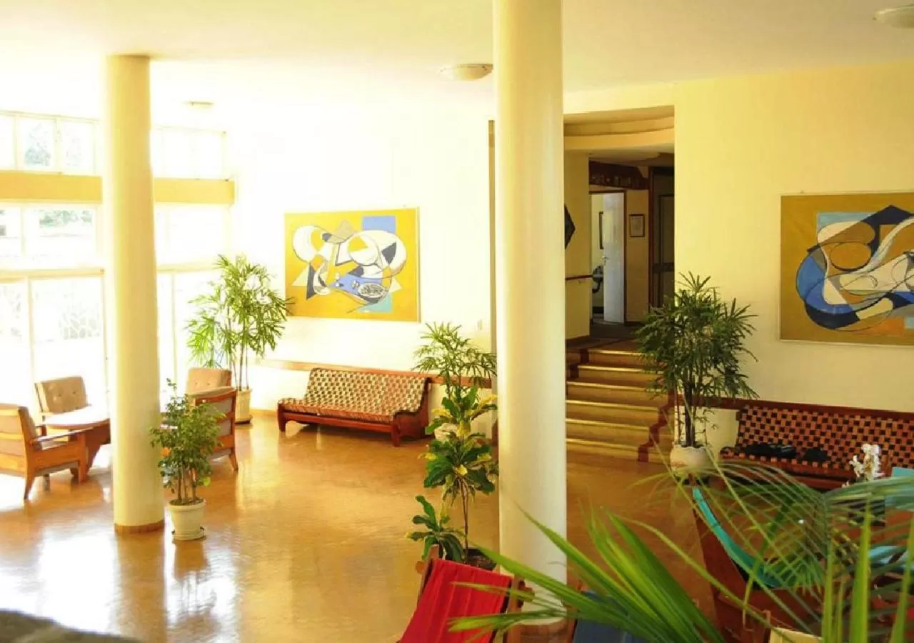 Communal lounge/ TV room, Lobby/Reception in Hotel Cataguases