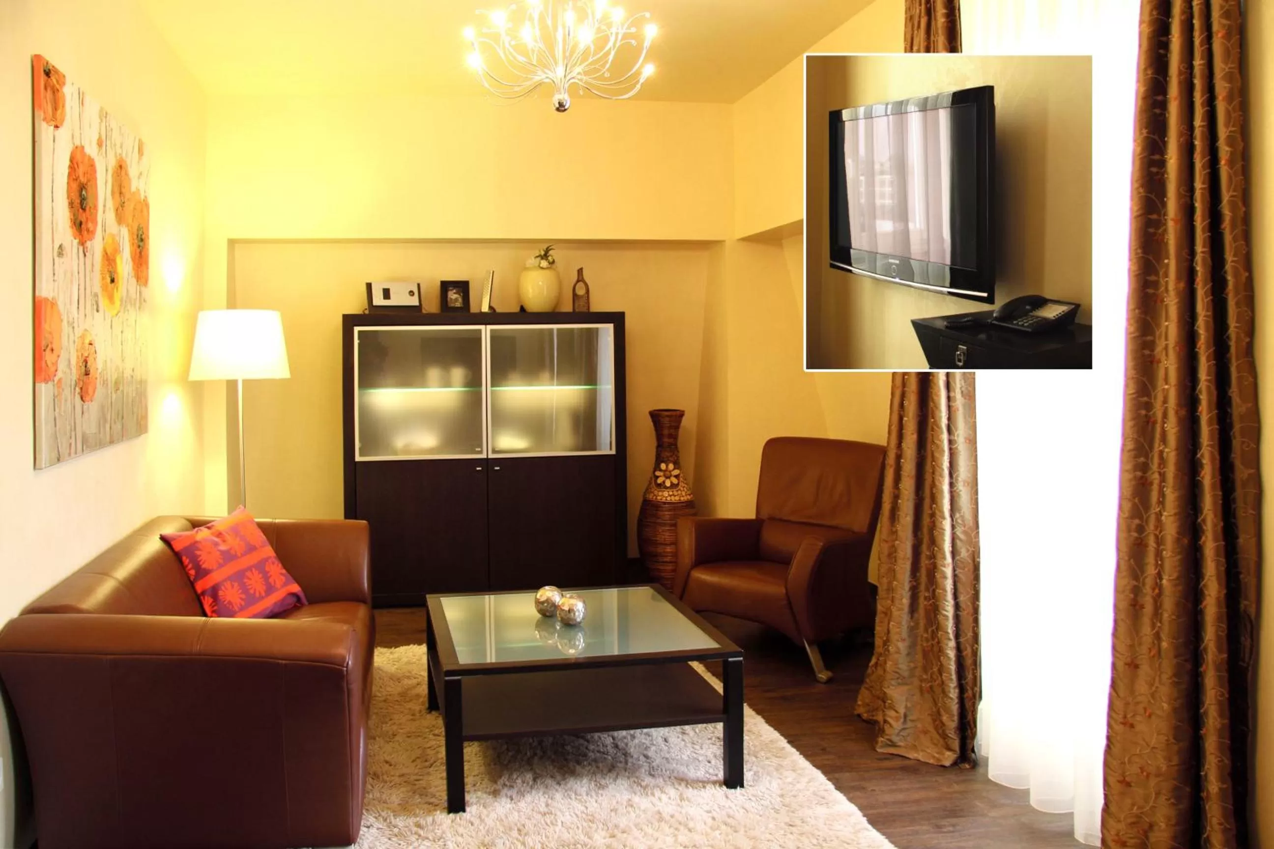 Living room, TV/Entertainment Center in Villa Astoria - Suiten am Meer