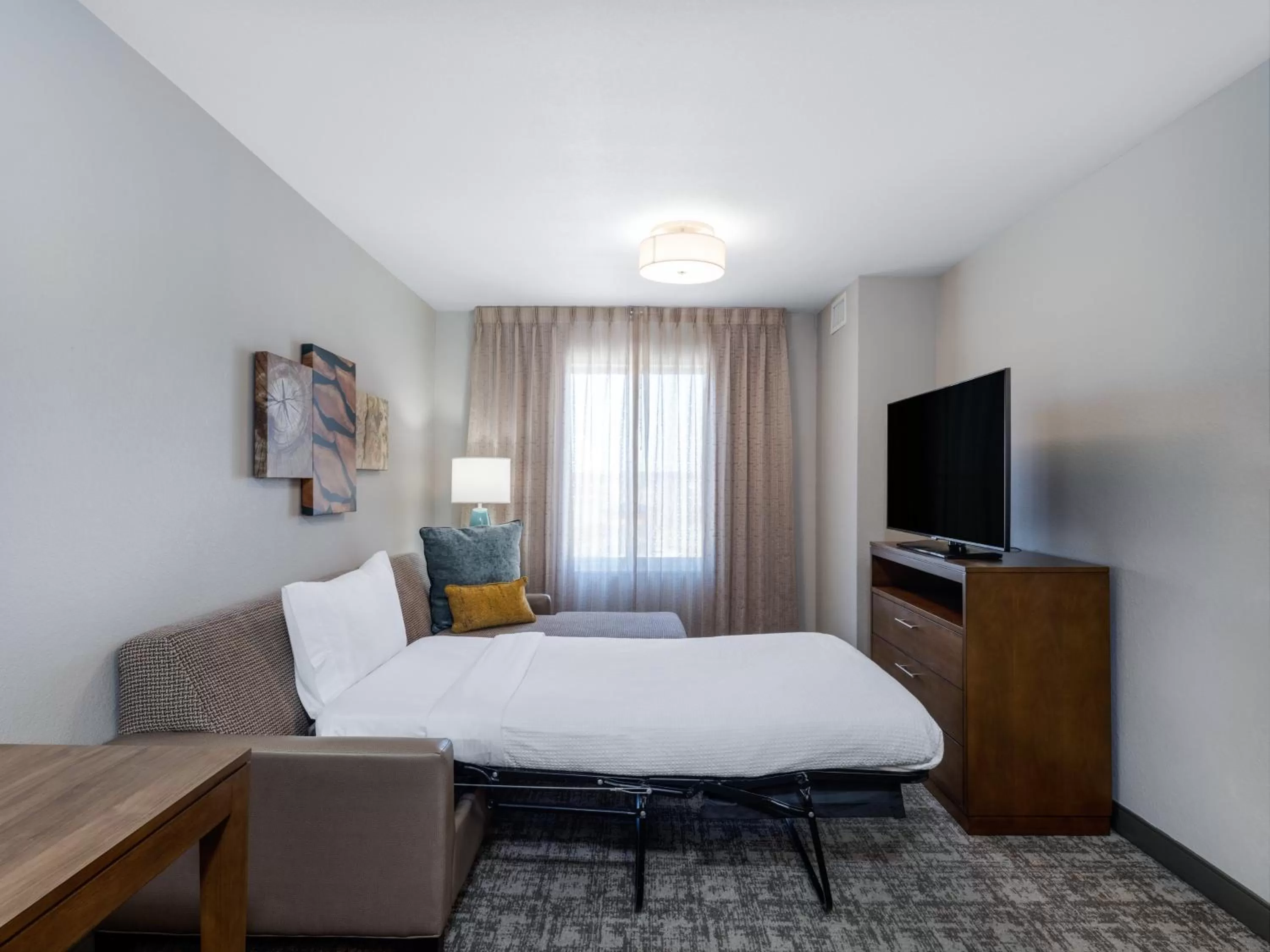 Photo of the whole room, Bed in Staybridge Suites - Sioux City Southeast by IHG