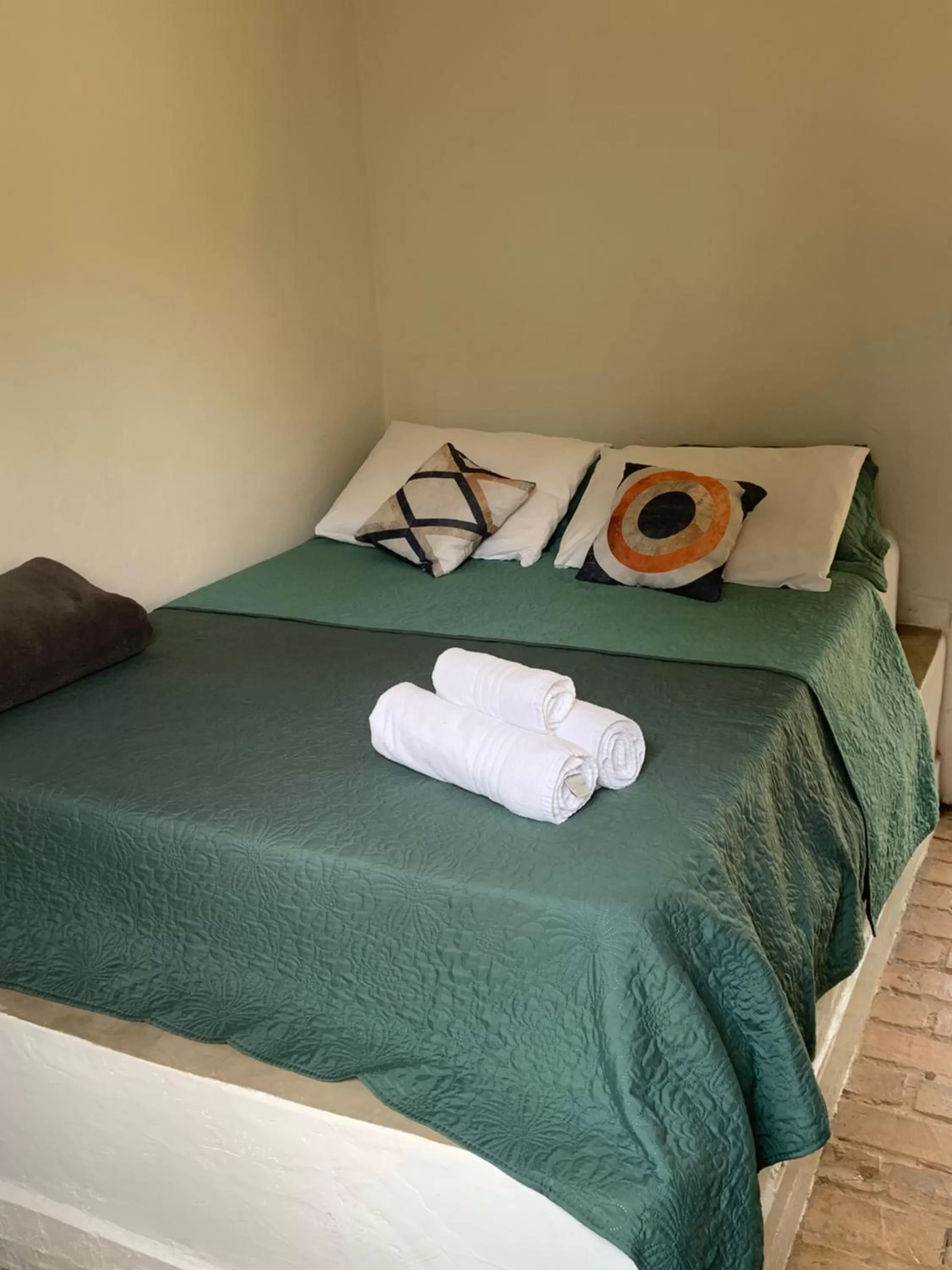 Bed in Pousada Cantinho do Mundo