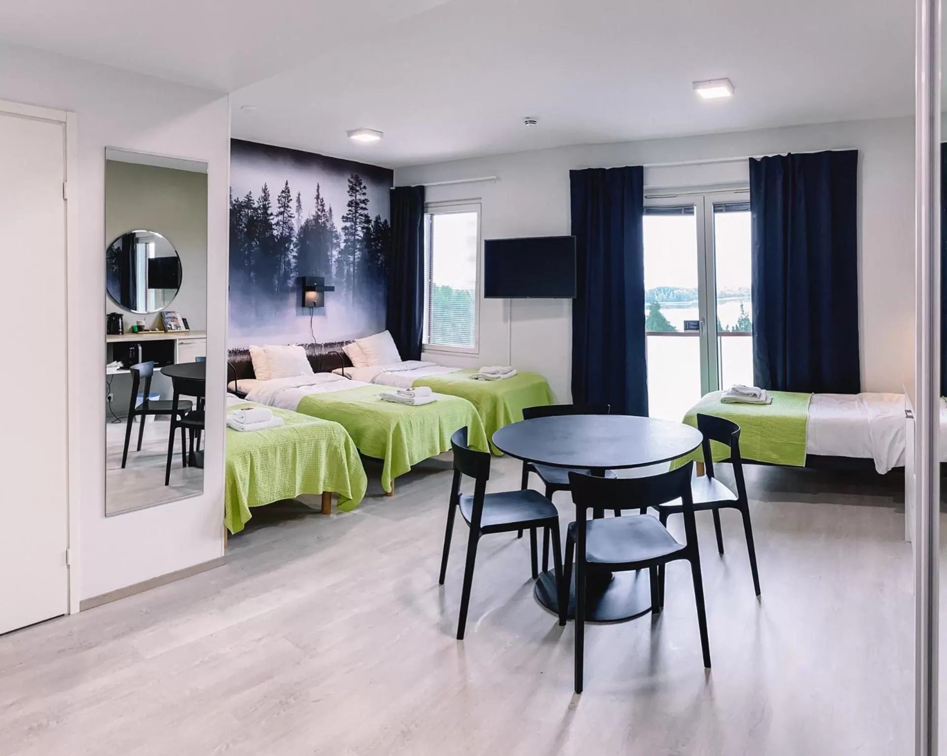 Bed in Hotelli Kuohu Kangasala - Hotel and Apartments by UHANDA