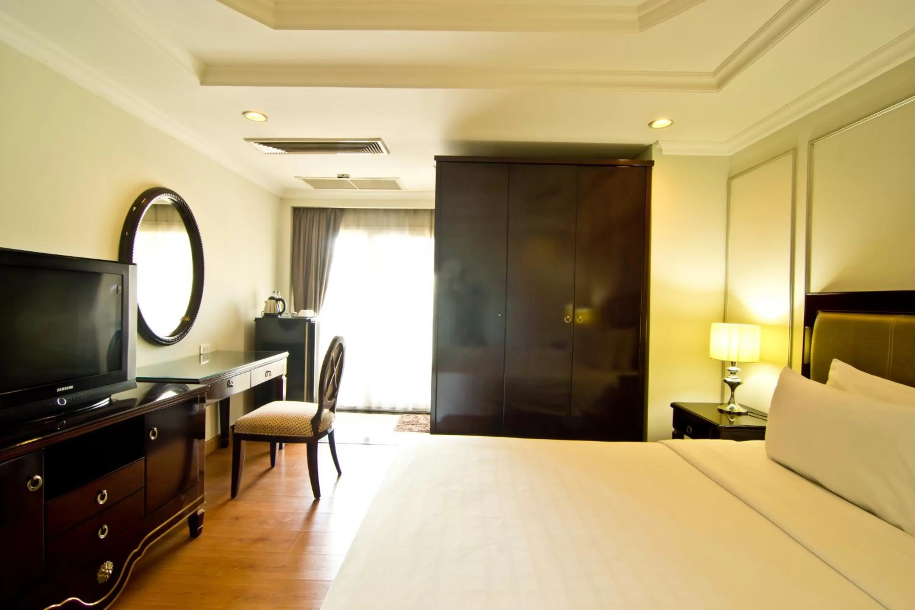 Photo of the whole room, Bed in LK Mantra Pura Resort