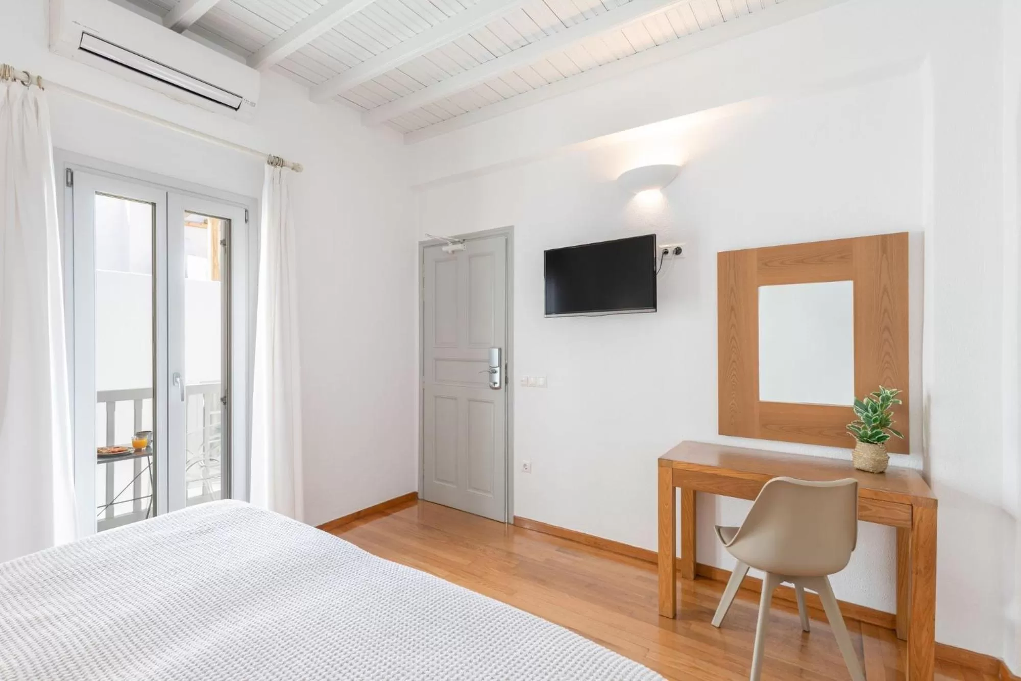 Seating area, Bed in Elena Hotel Mykonos