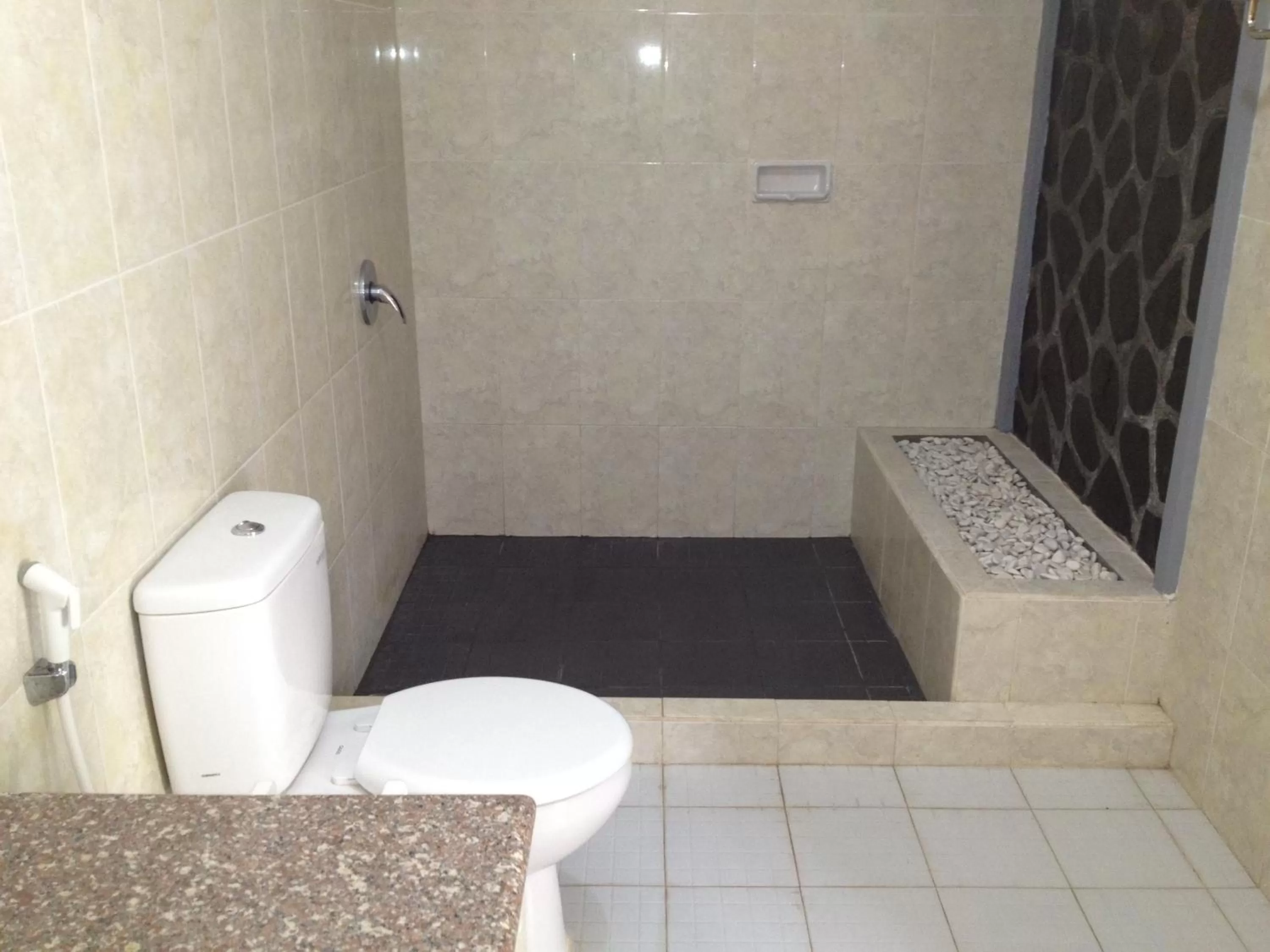 Bathroom in Astina Hotel