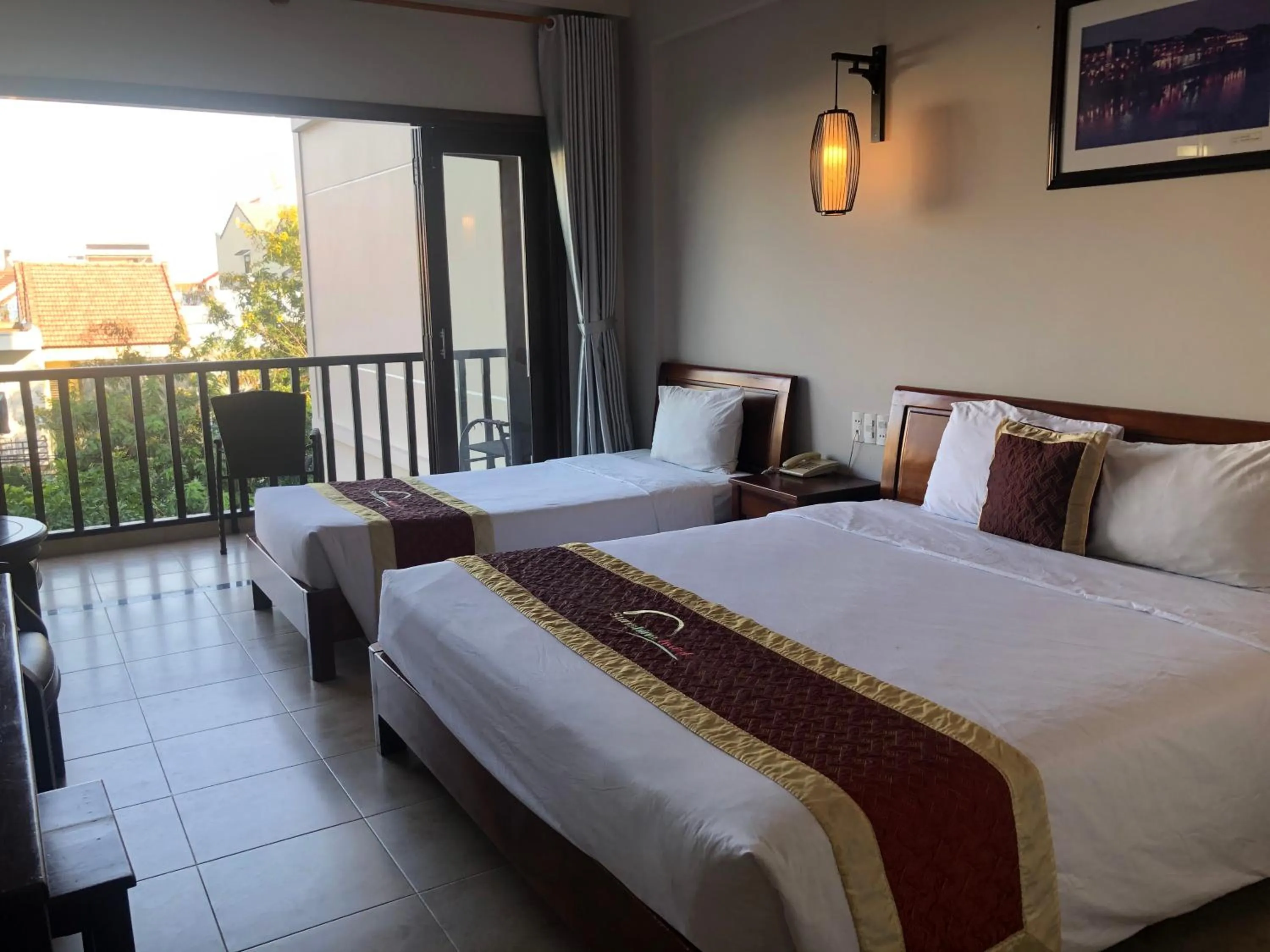 Bed in Sunshine Hoian Hotel