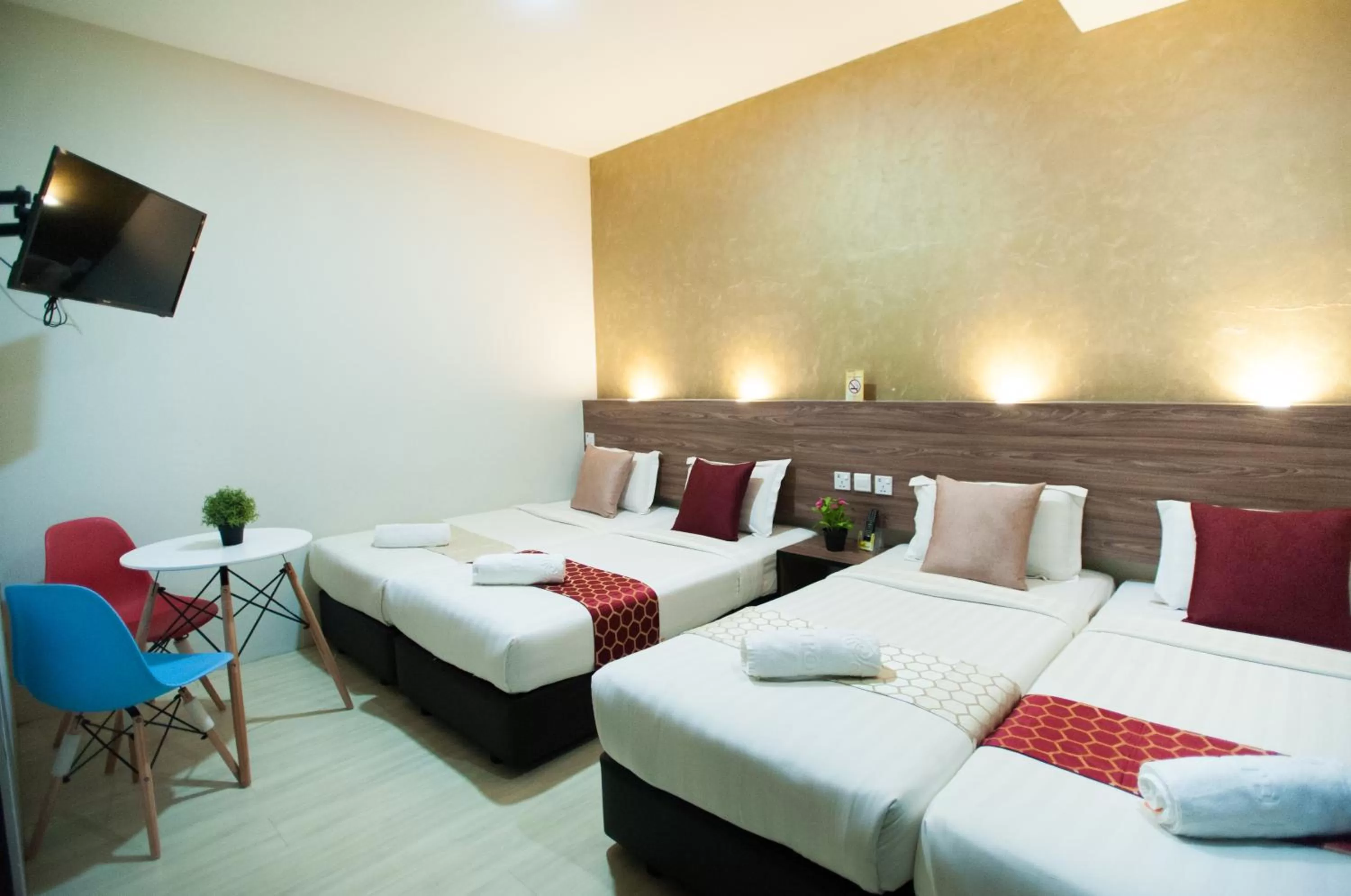 Bed in DJ Citi Point Hotel