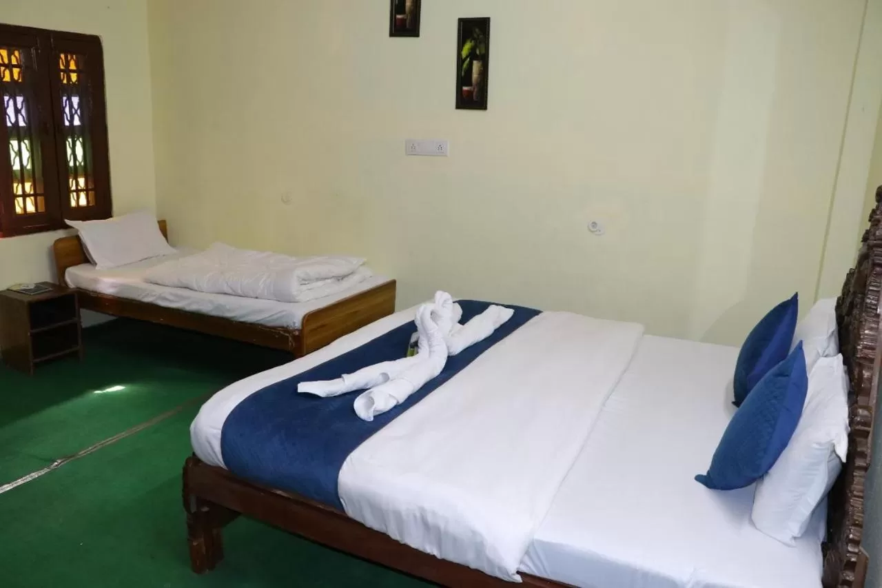 Bed in The Maurvi Inn