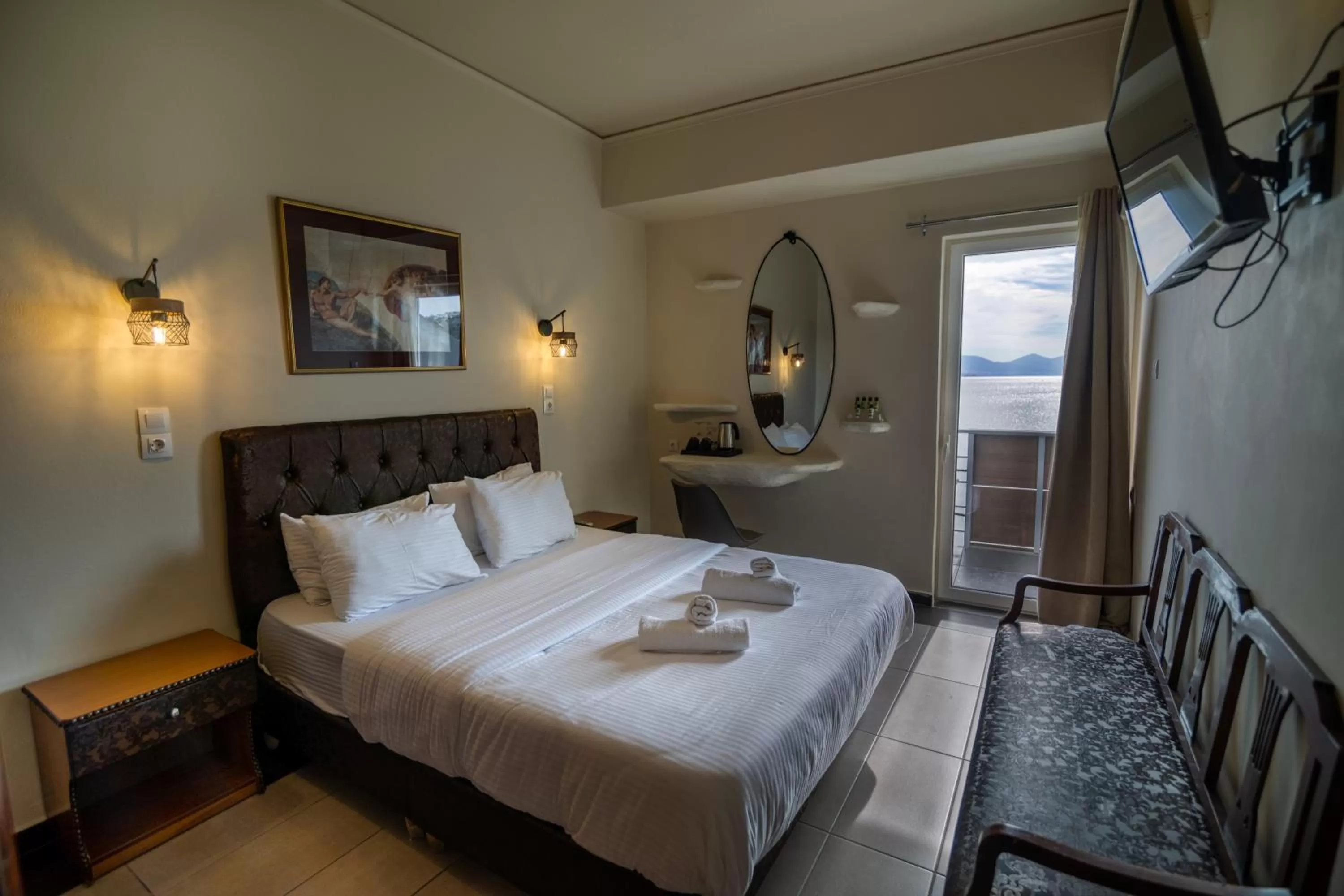 Bed in Votsalakia Hotel & Luxury Apartments