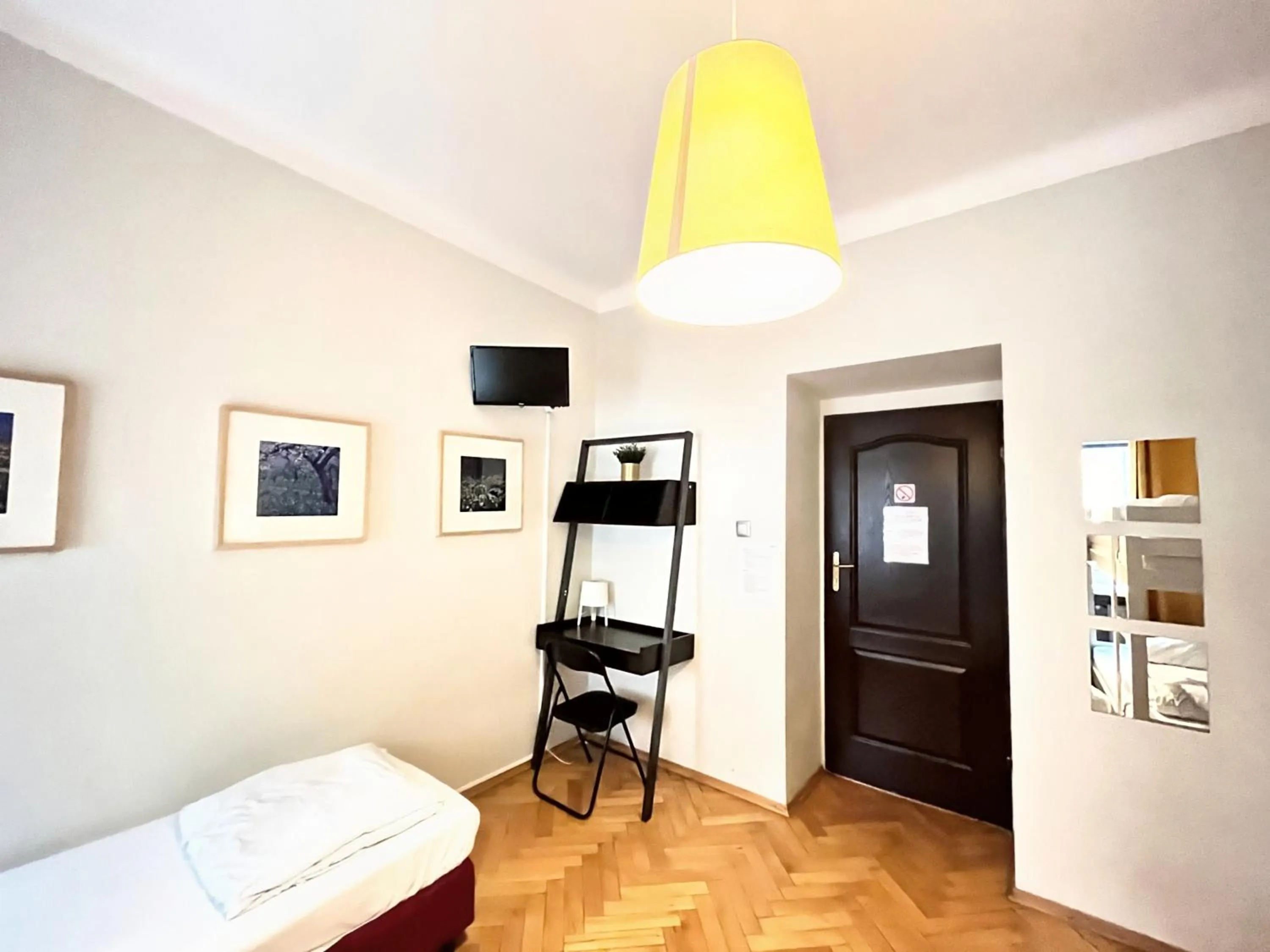 Photo of the whole room, Bed in Hostel Helvetia Rooms Warsaw CITY CENTER and OLD TOWN