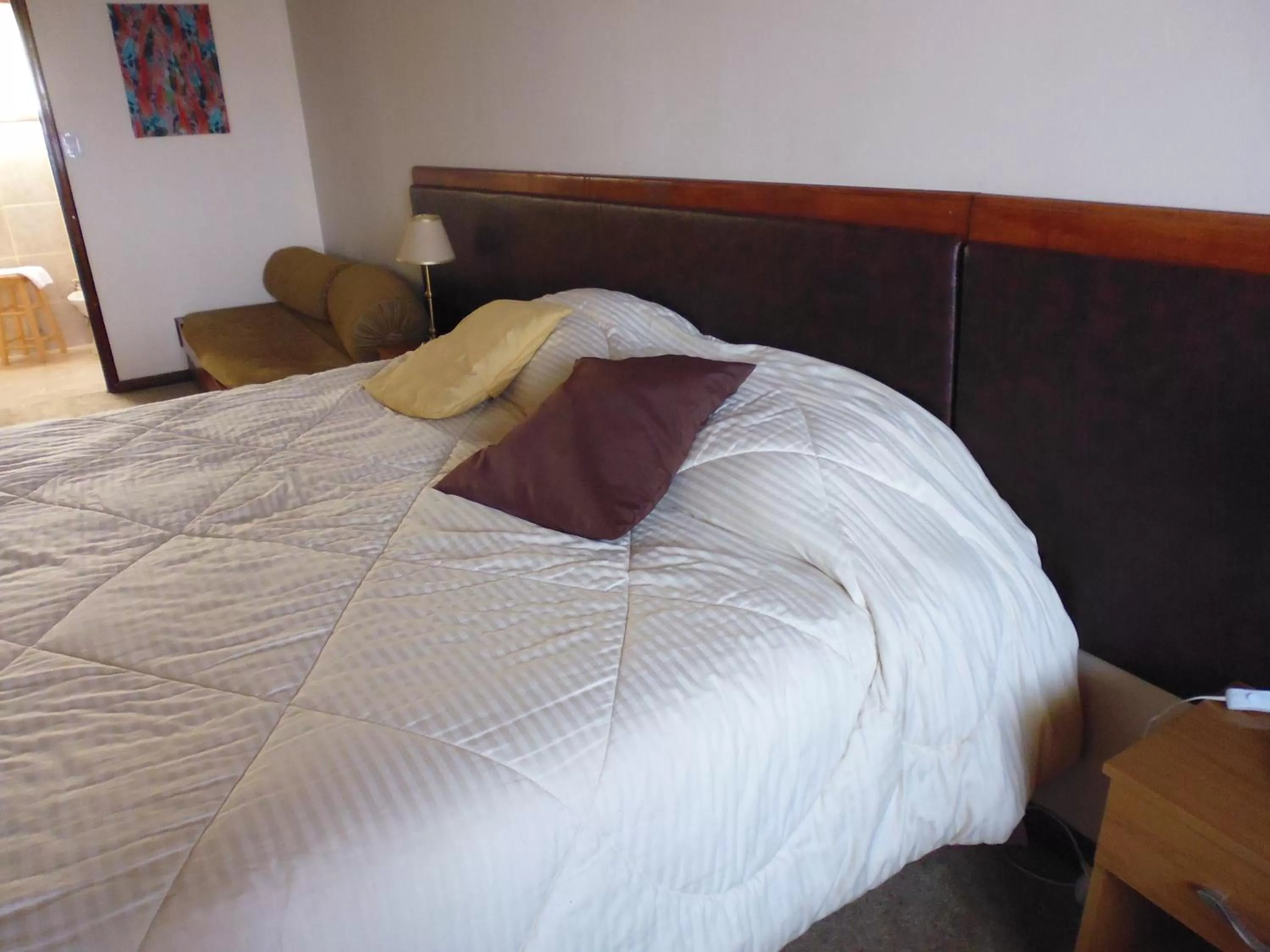 Bed in Tango B&B