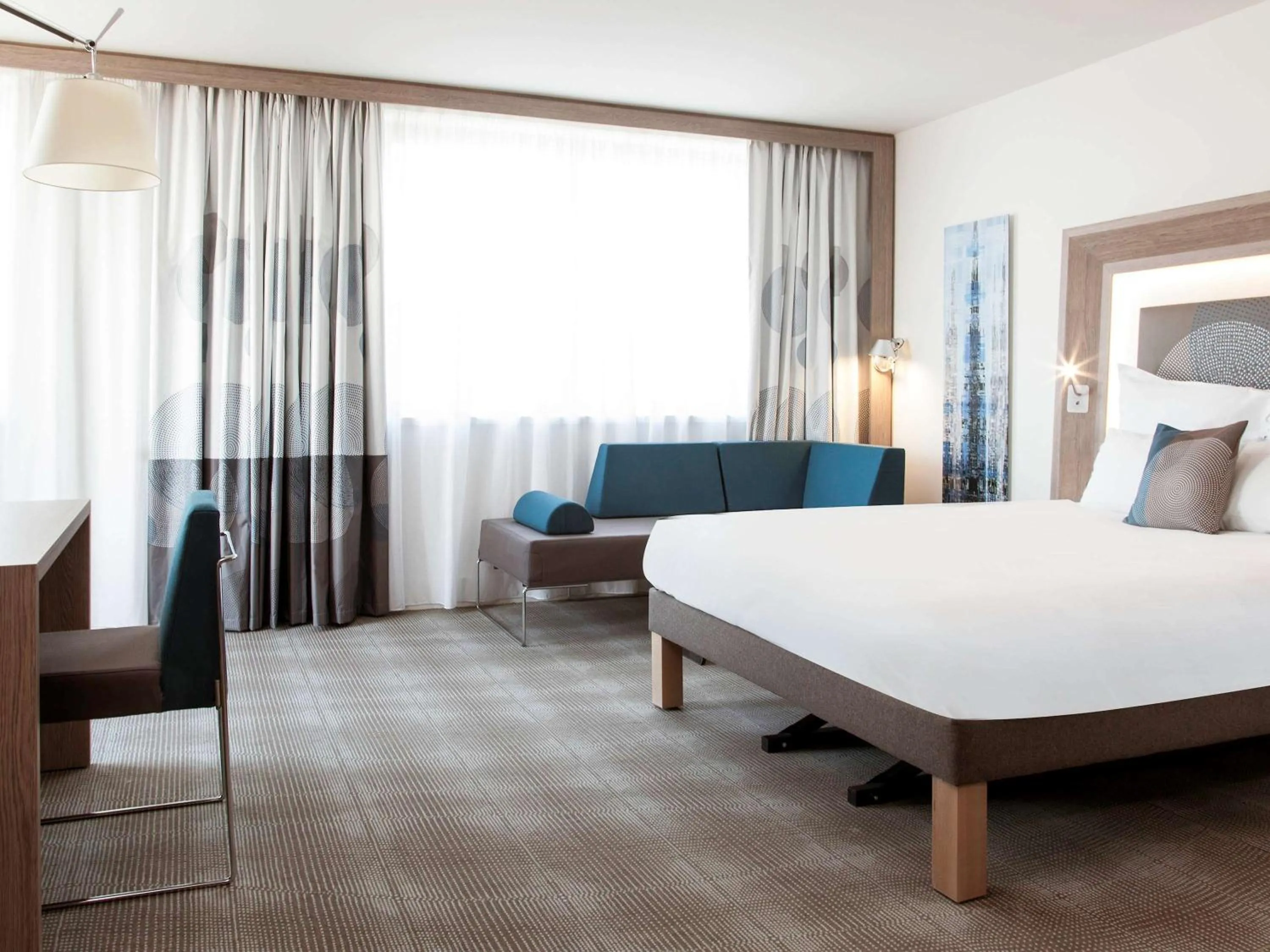 Suite with 1 double bed and twin beds in Novotel Paris Saint Denis Stade Basilique