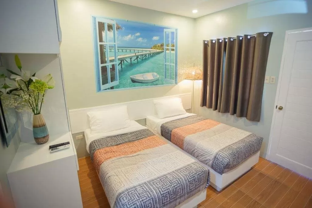 Bed in Tropical Fun Ta Sea Rentals