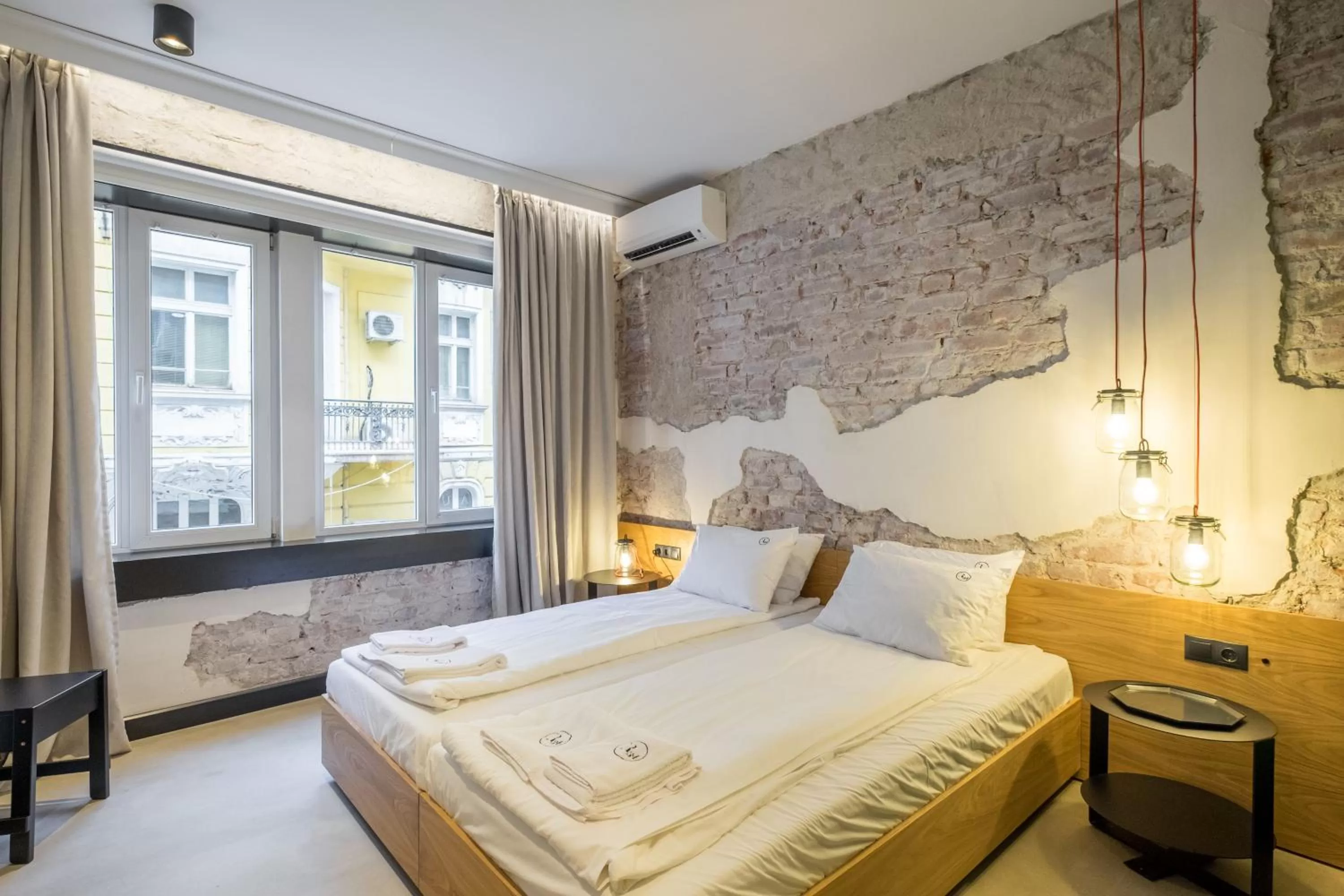 Bed in R34 Boutique Hotel