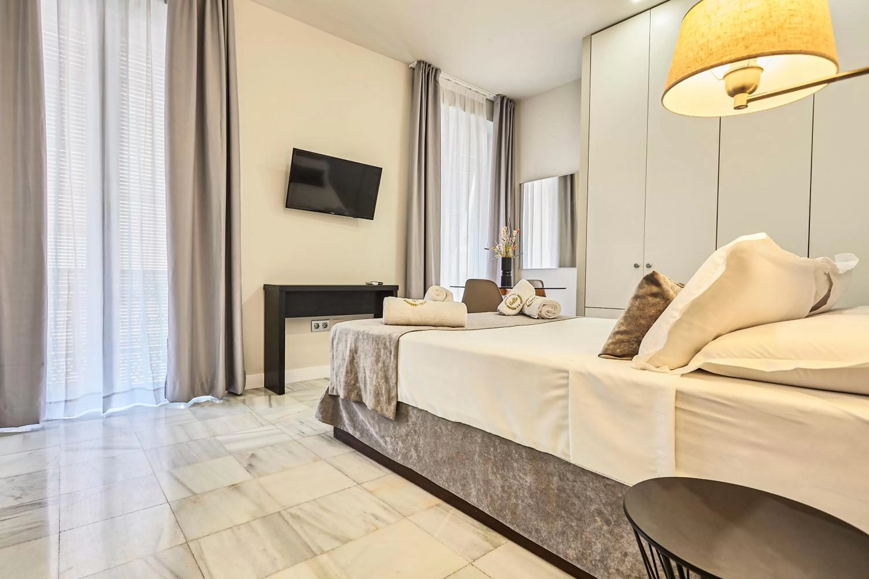 Bed in Hello Alicante Apartamentos