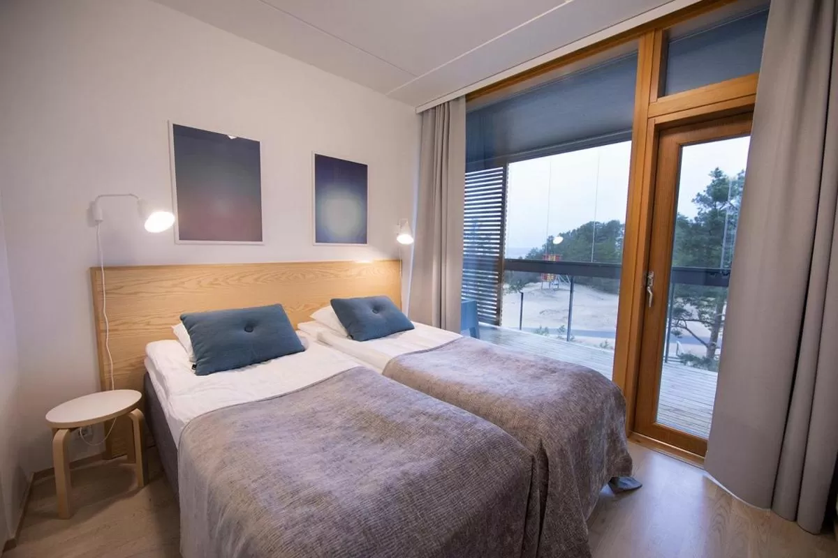 Bed in Santa's Resort & Spa Hotel Sani