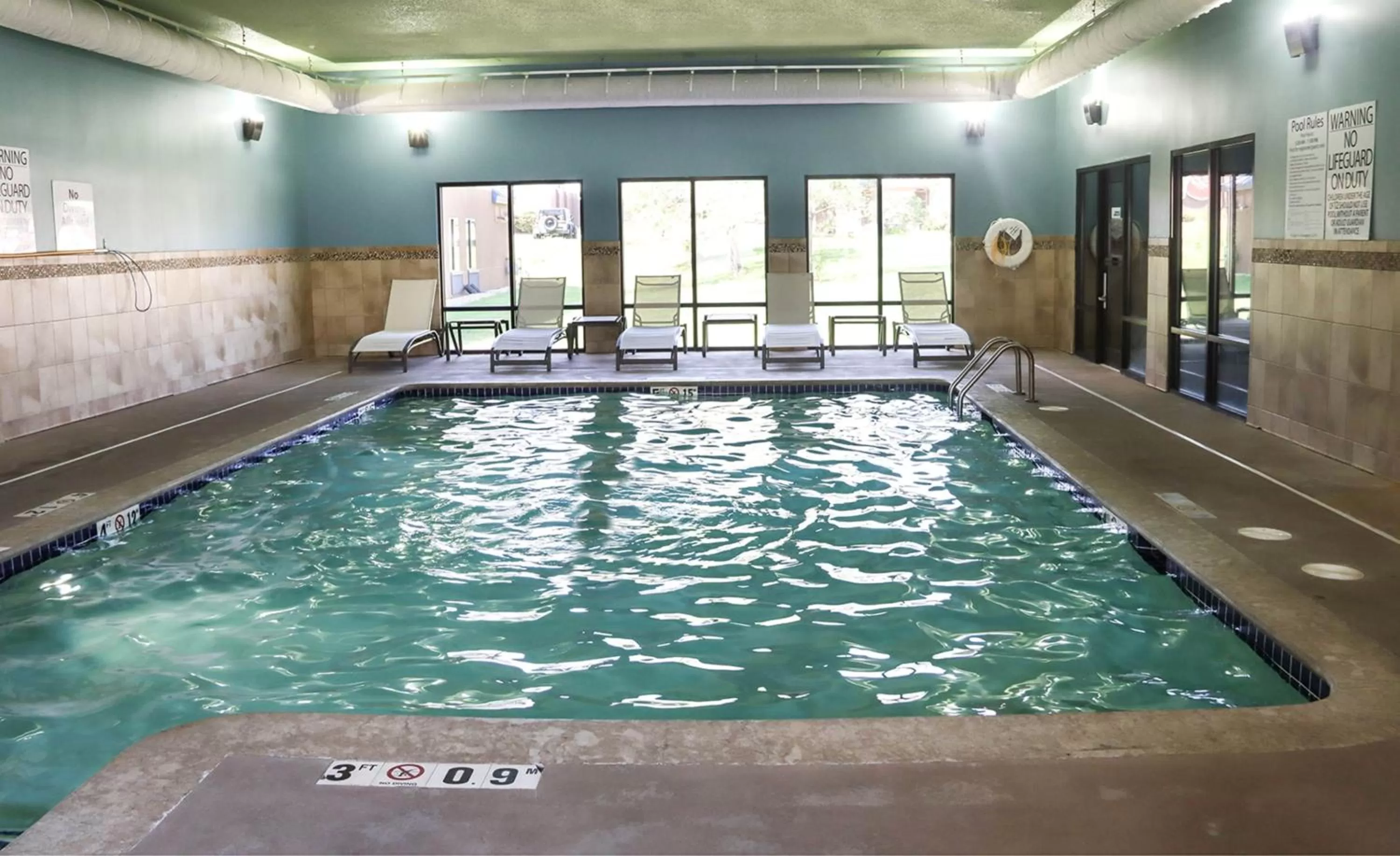 Swimming pool in Holiday Inn Express Cedar Rapids - Collins Road by IHG