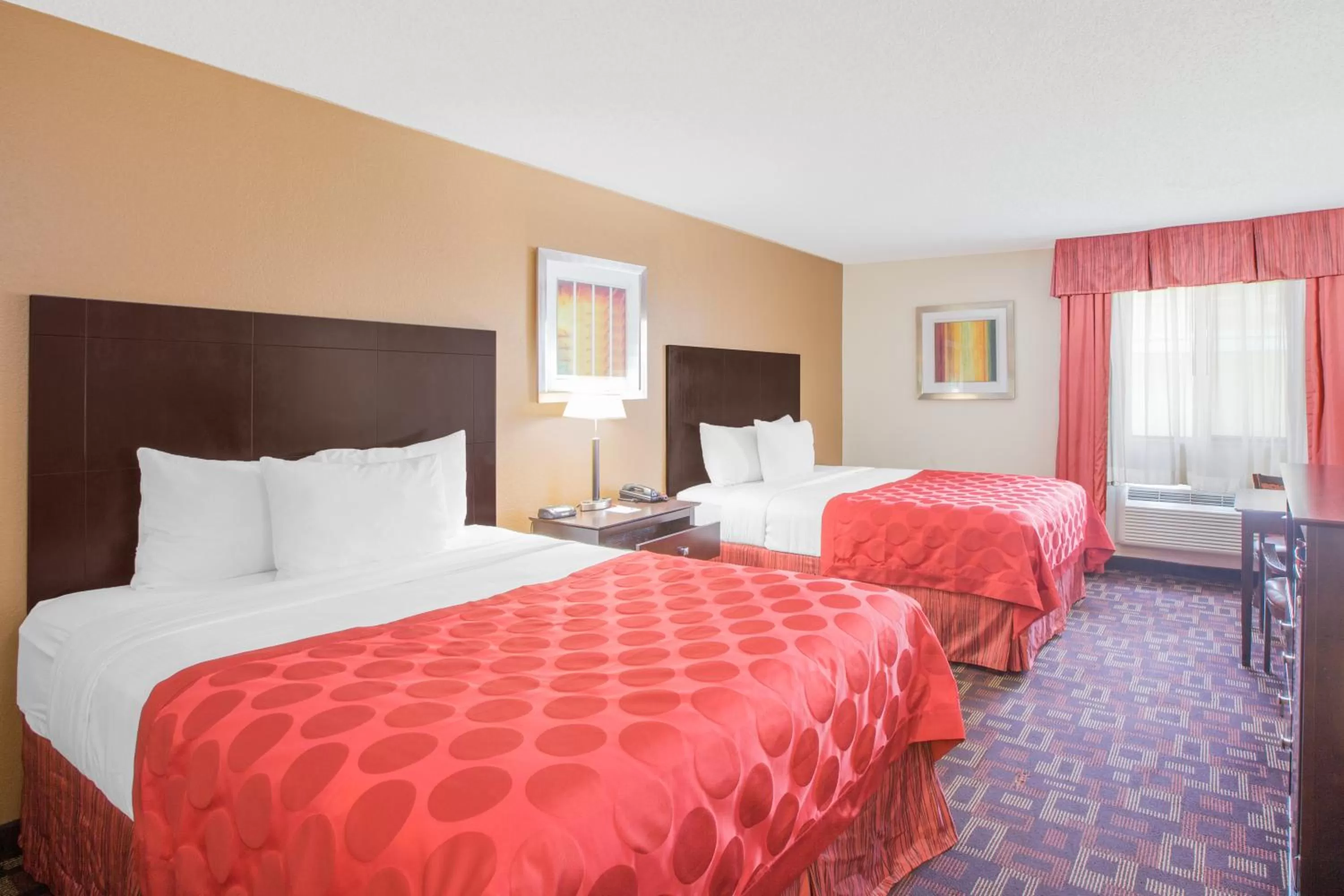 Bed in Ramada by Wyndham Tulsa