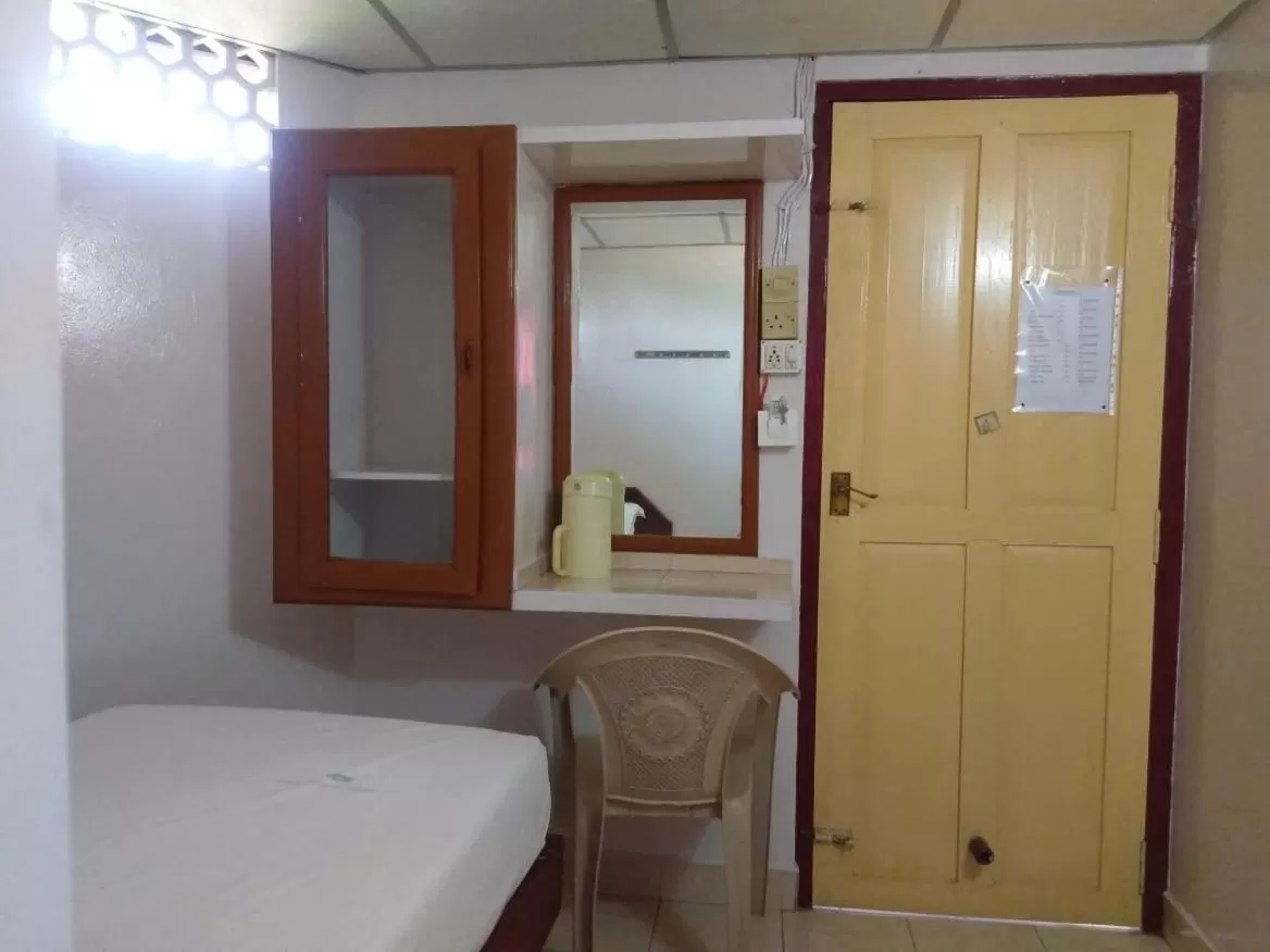 Bathroom in Anandan Tourist Home
