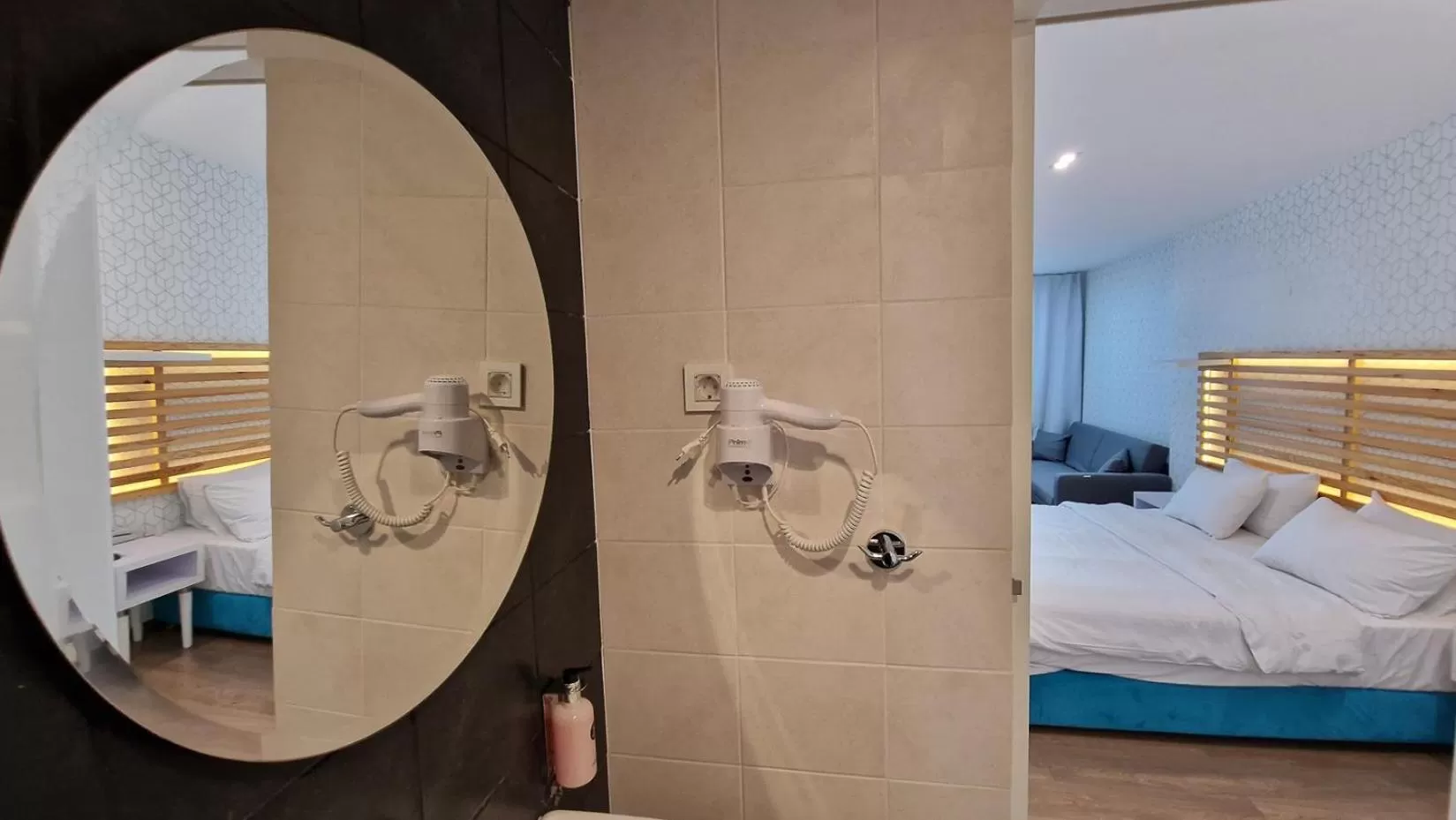 Bed in Athenian Montaza Hotel