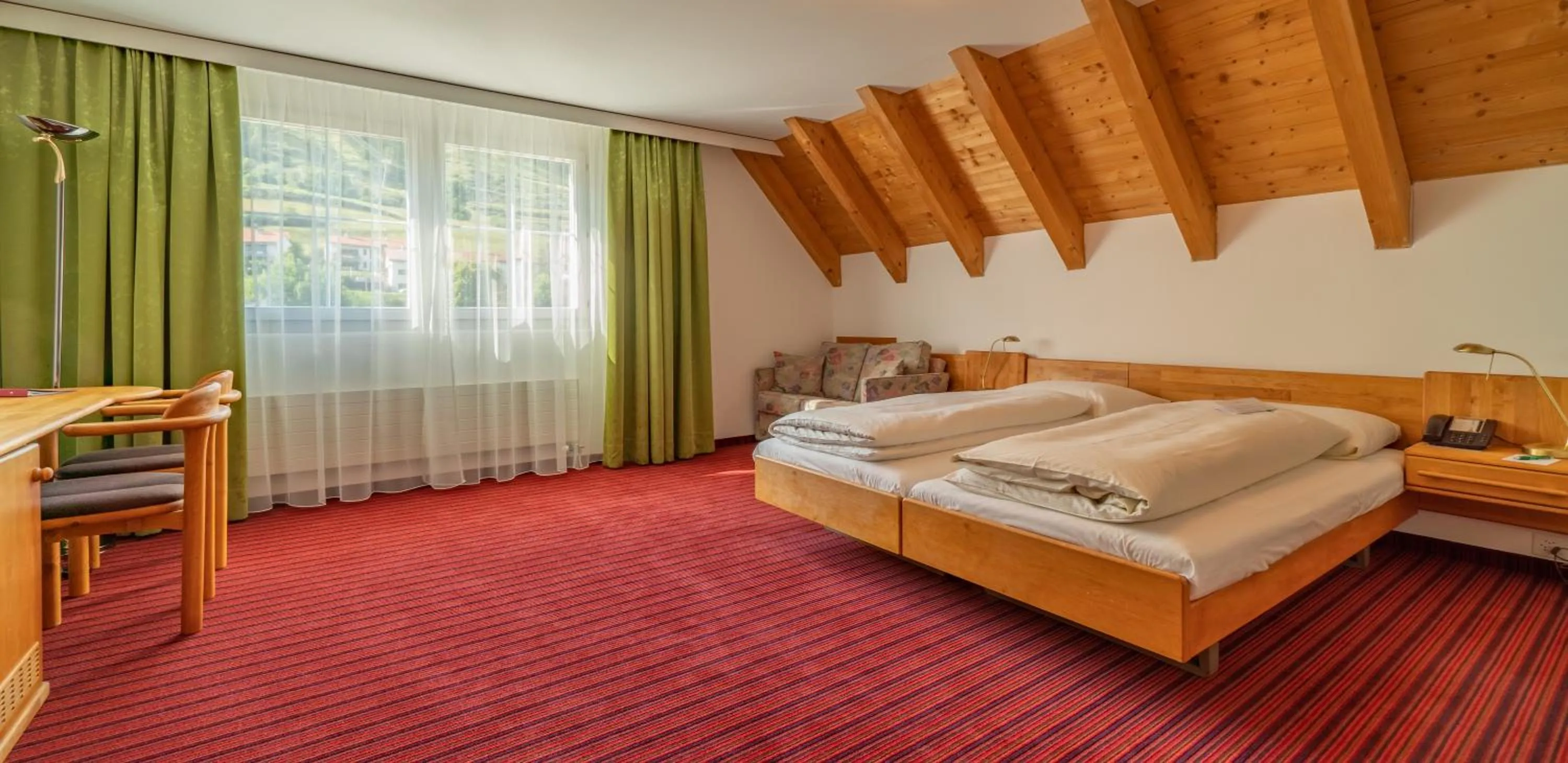 Bedroom, Bed in Typically Swiss Hotel Altana