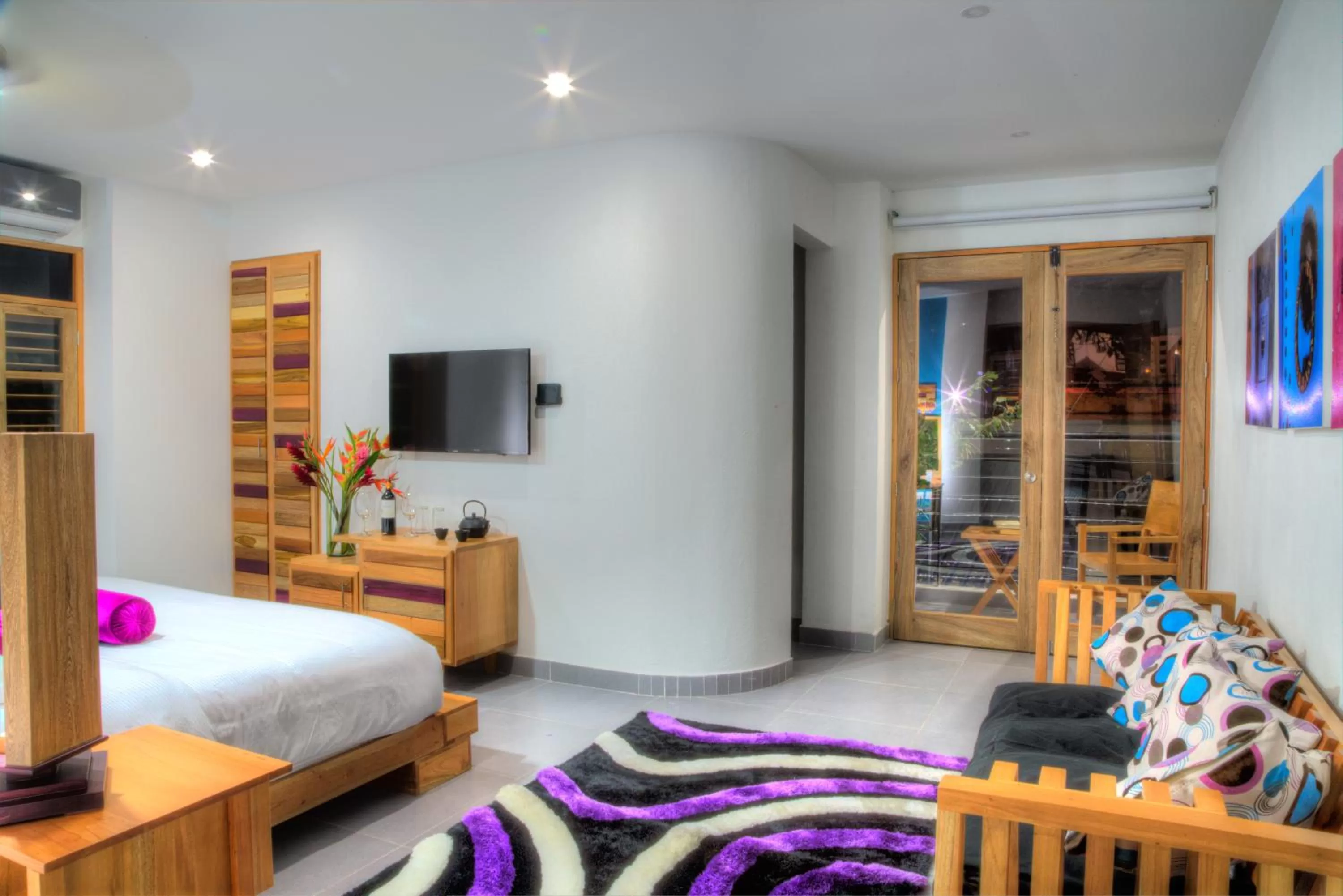 Photo of the whole room, TV/Entertainment Center in Casa de Leda, a Kali Hotel