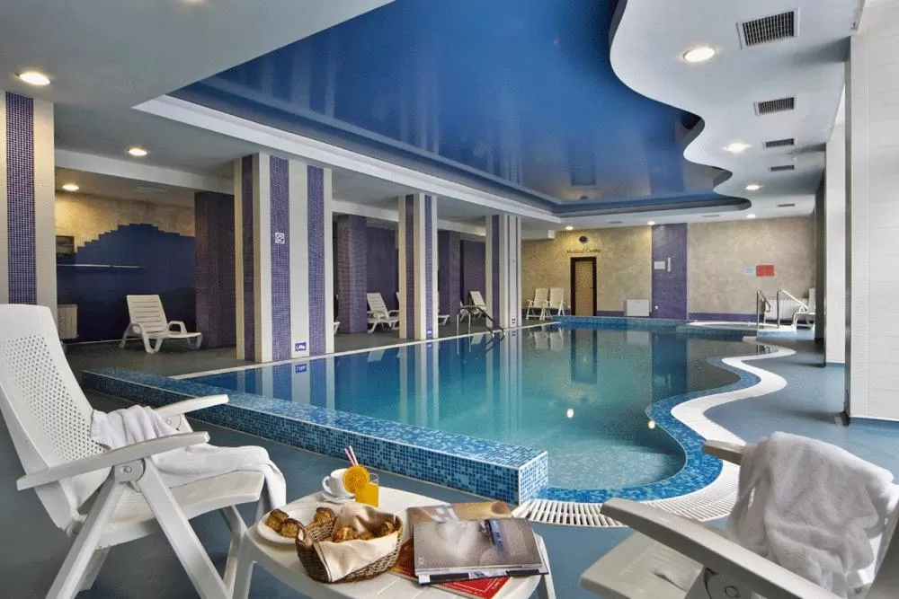 Swimming pool in Rhodopi Home Hotel Chepelare- Half Board & Wellness