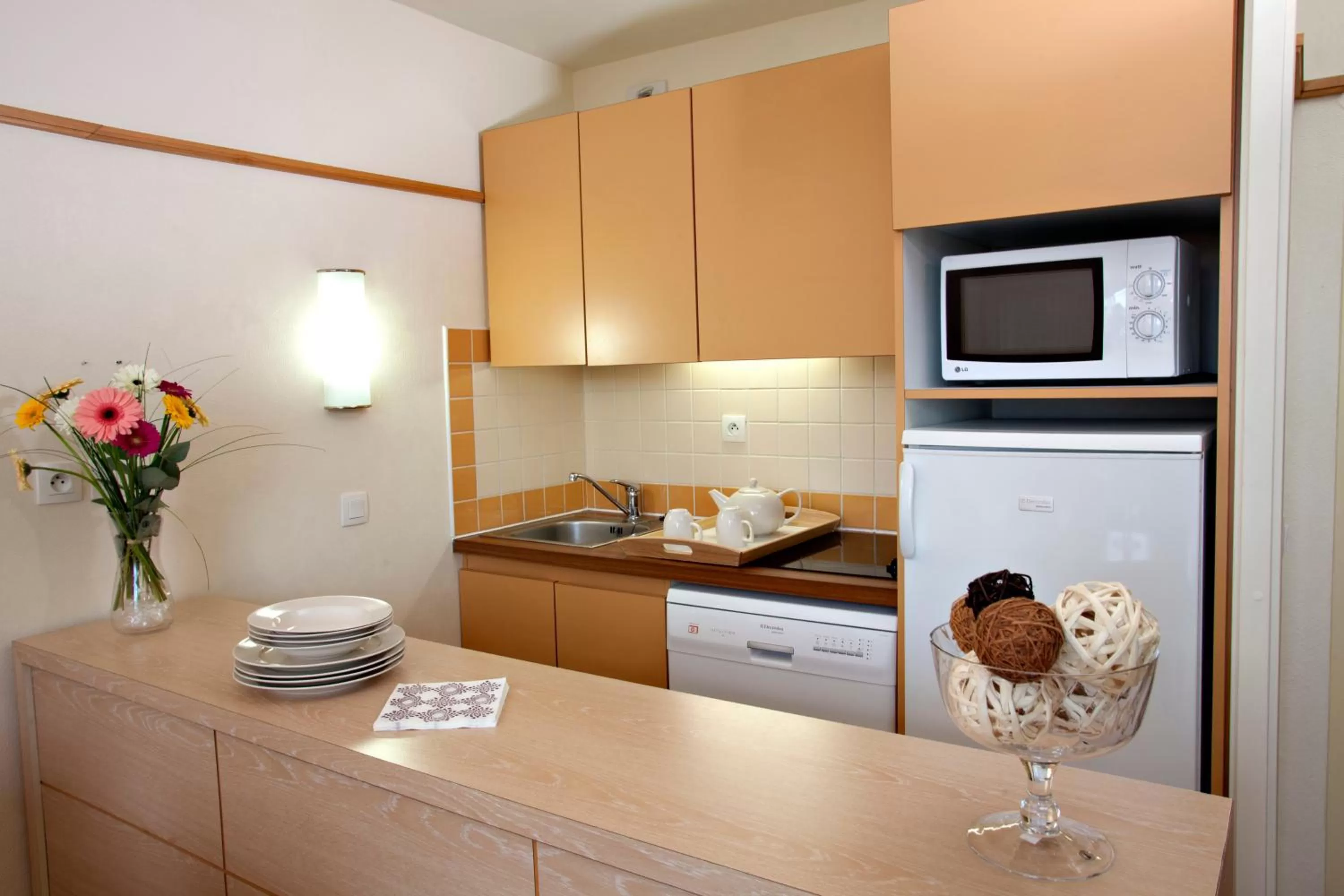 Kitchen or kitchenette in Pierre & Vacances Le Moulin des Cordeliers