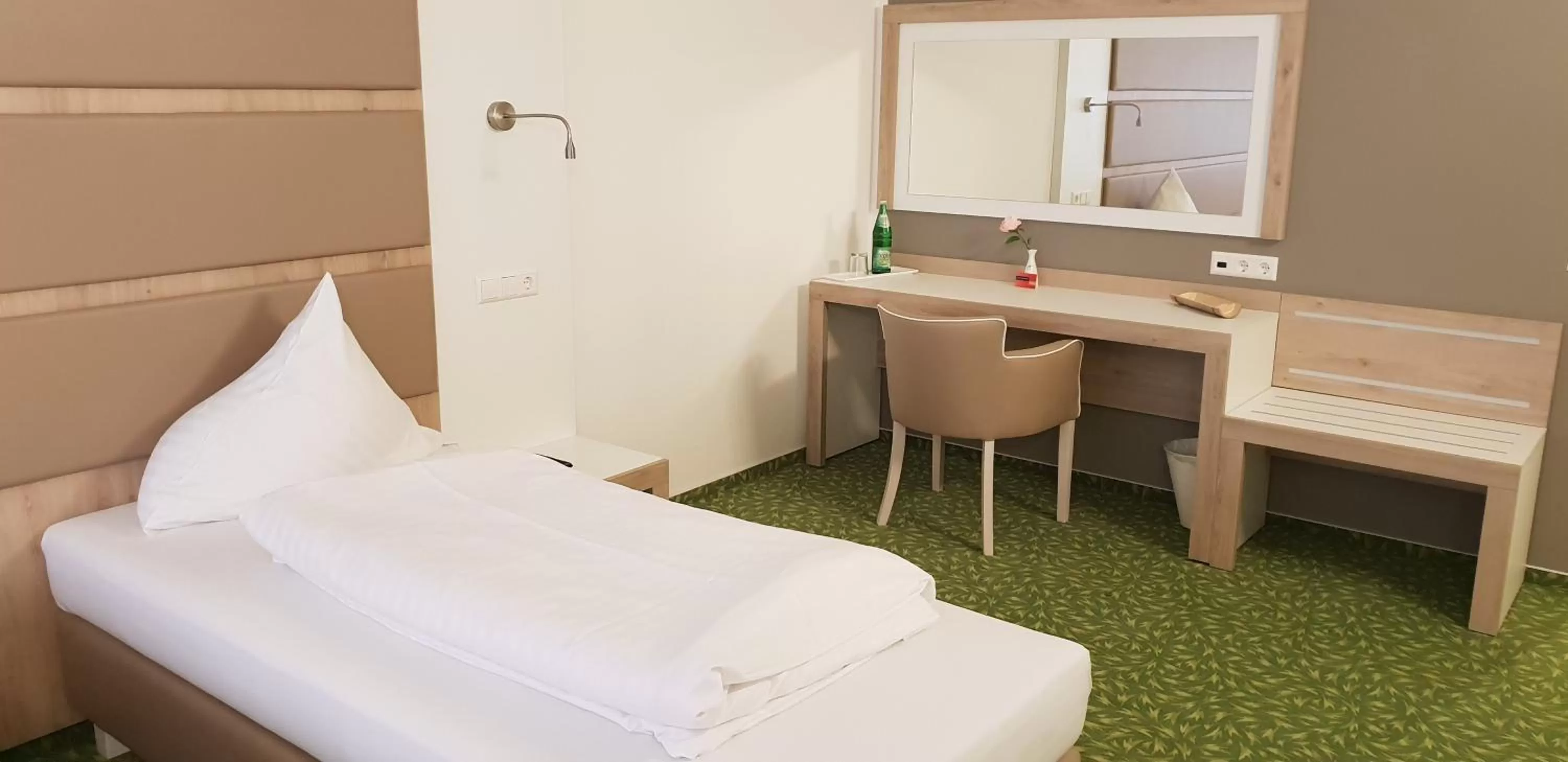 Bed in Confour Hotel