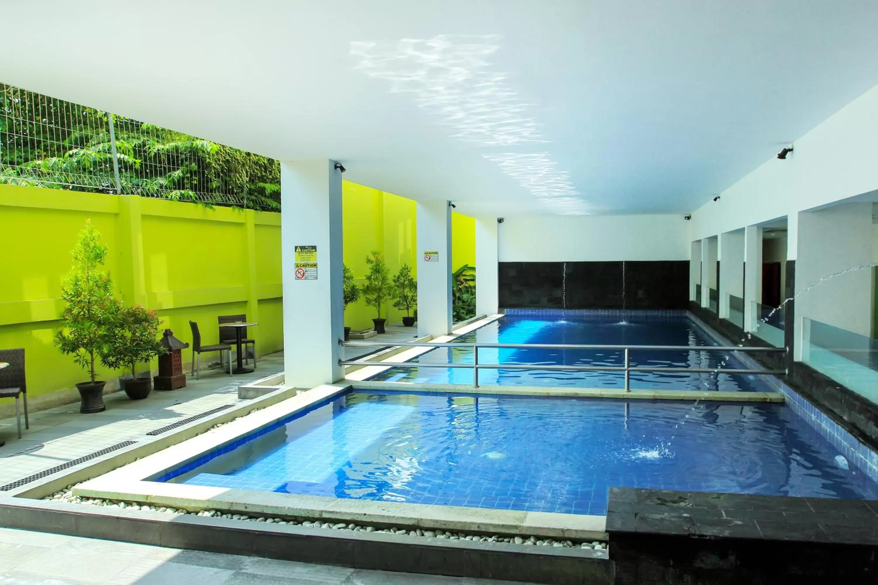 Swimming pool in Zest Yogyakarta by Swiss-Belhotel International