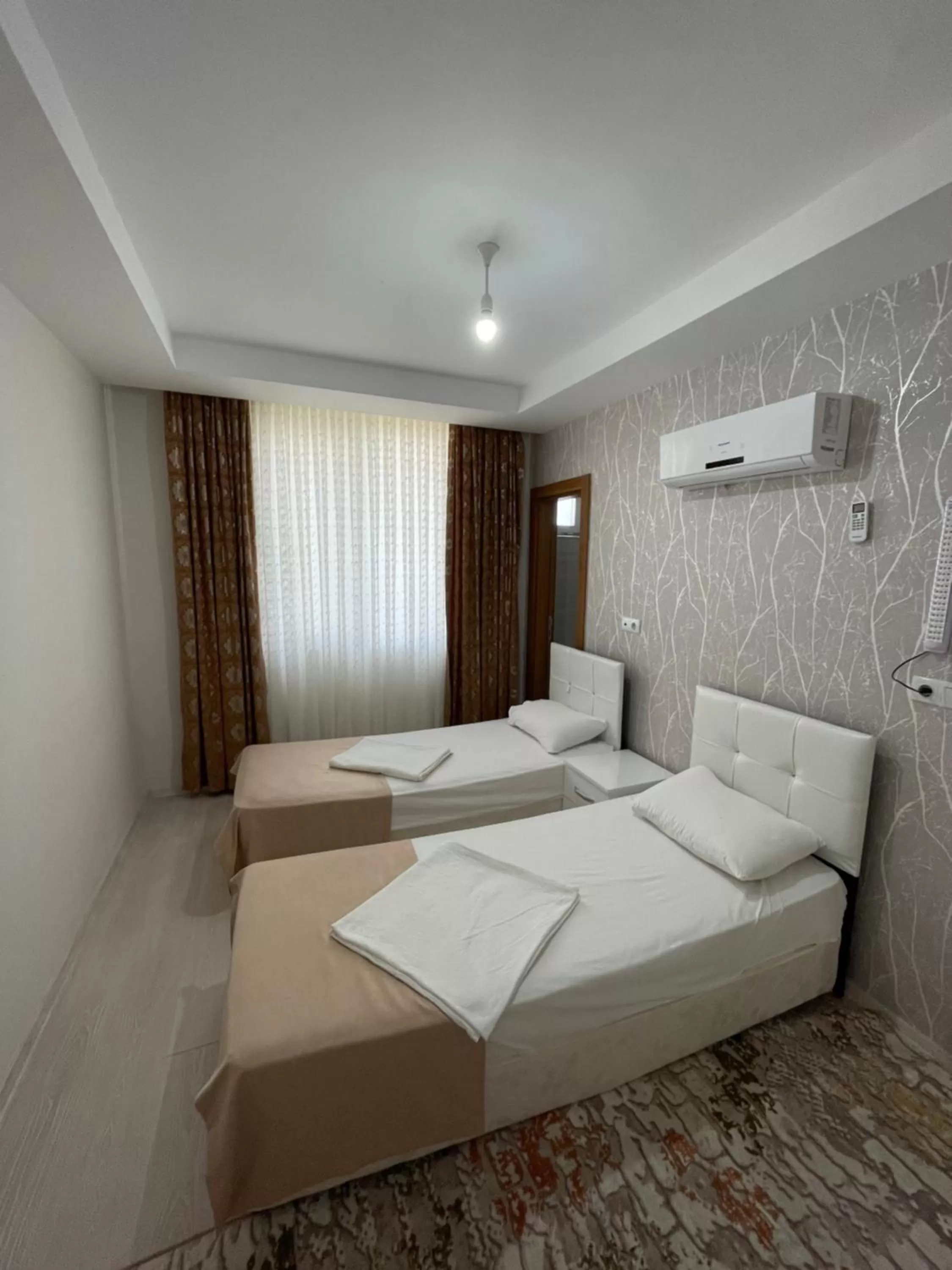 Bedroom, Bed in Mina Suit Apart