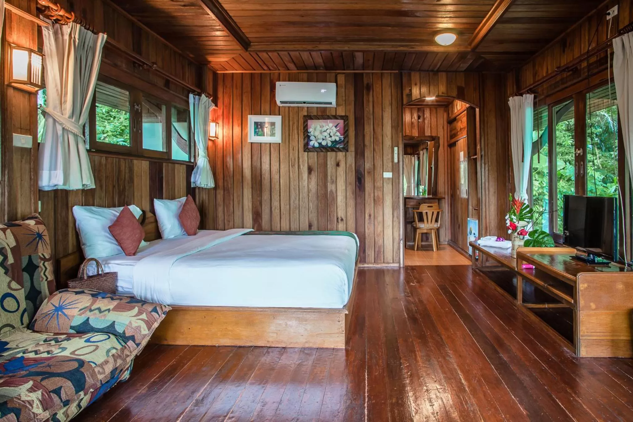 Bed in The Vatika Resort and Spa