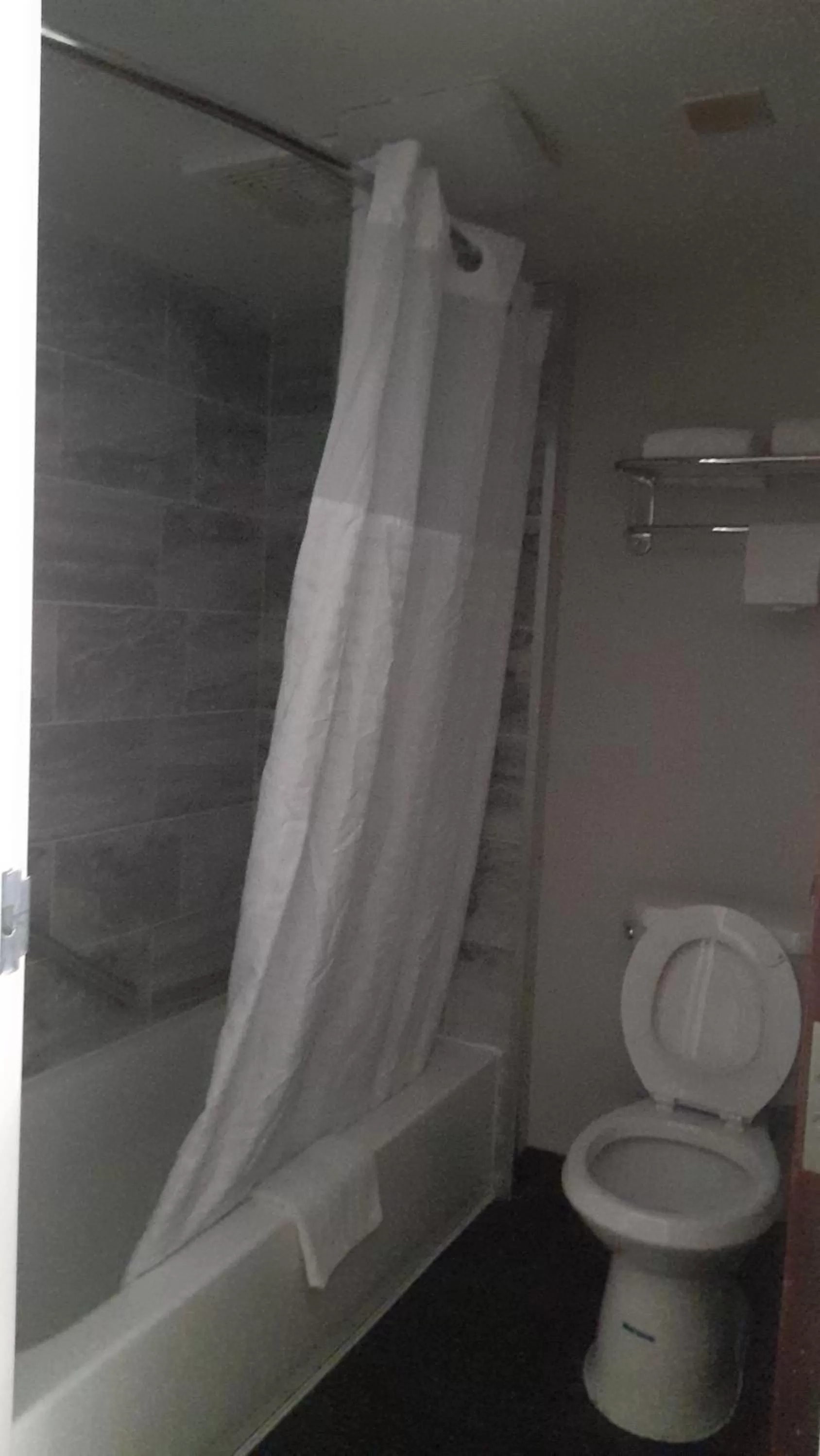 Bathroom in Super 8 Motel by Wyndham near Fort Lauderdale Arpt