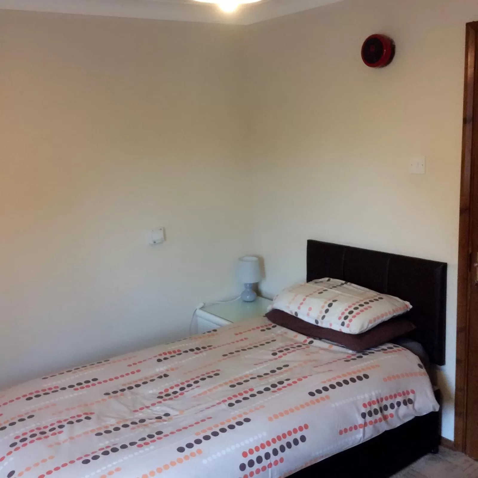 Bed in The Lodge Guest House