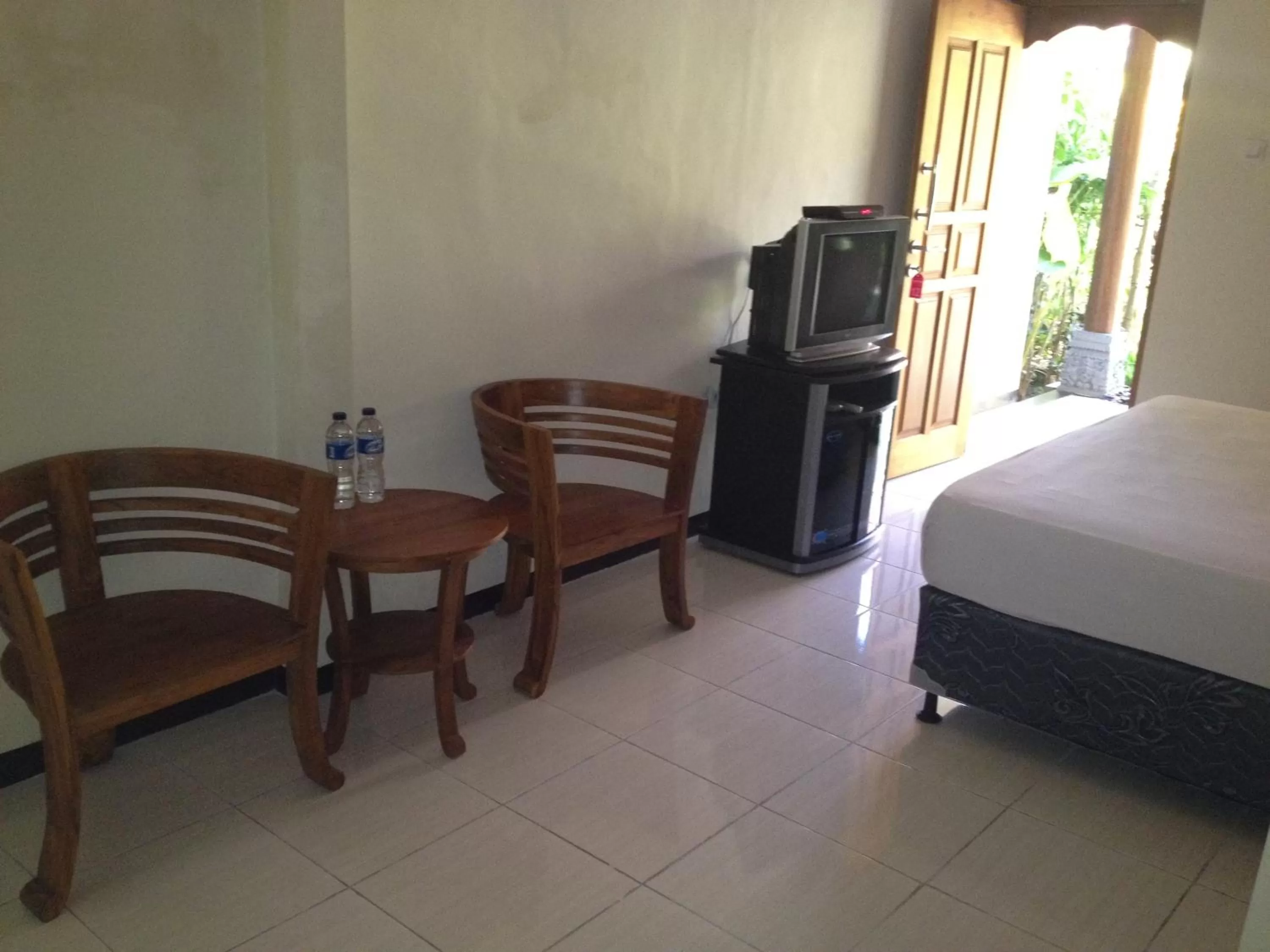 Bedroom, Dining Area in Astina Hotel