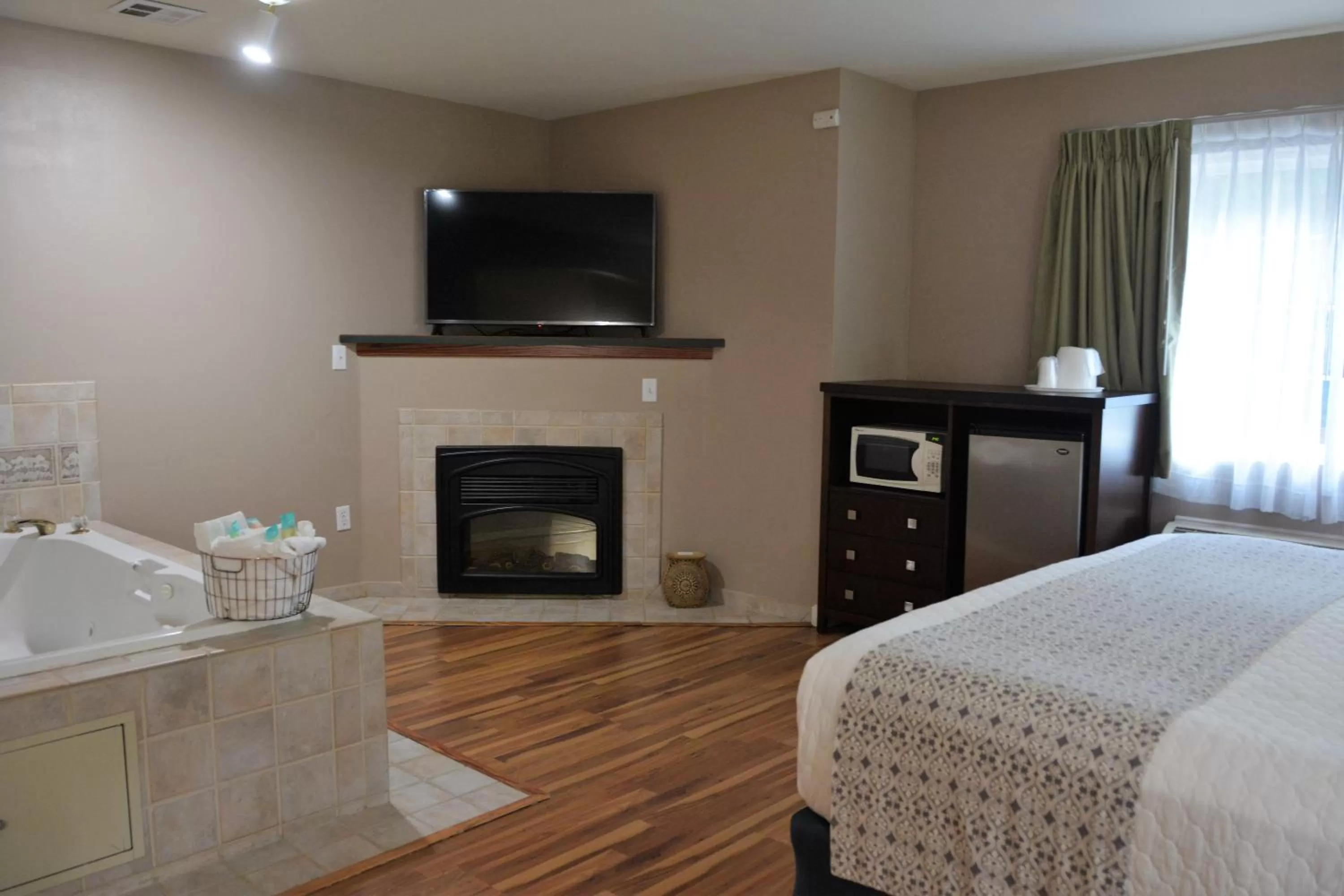 Bed in FairBridge Inn & Suites DuPont