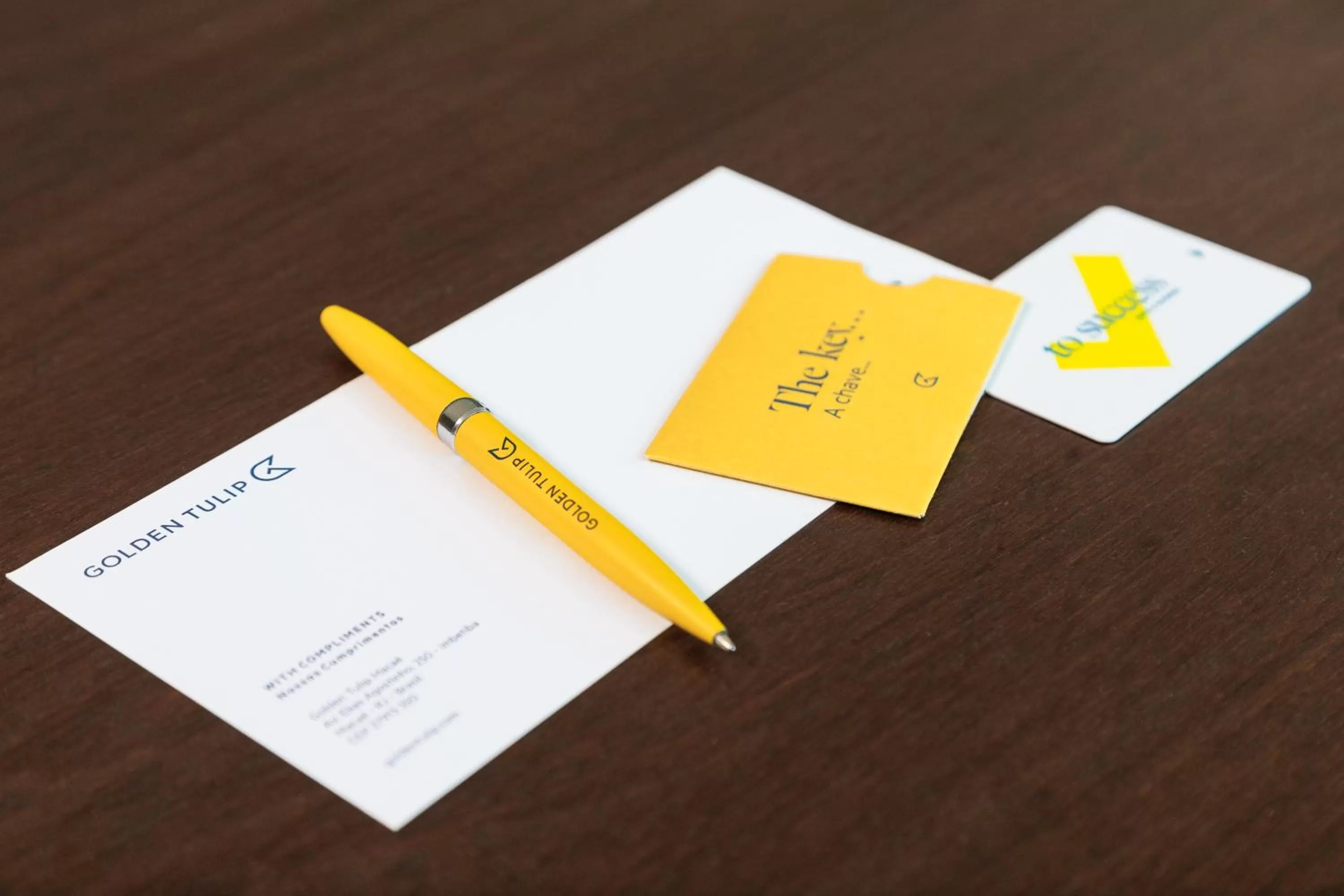 Logo/Certificate/Sign in Golden Tulip Macaé